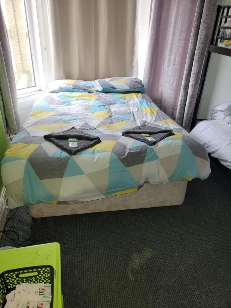 Bed in The Merlin Hotel