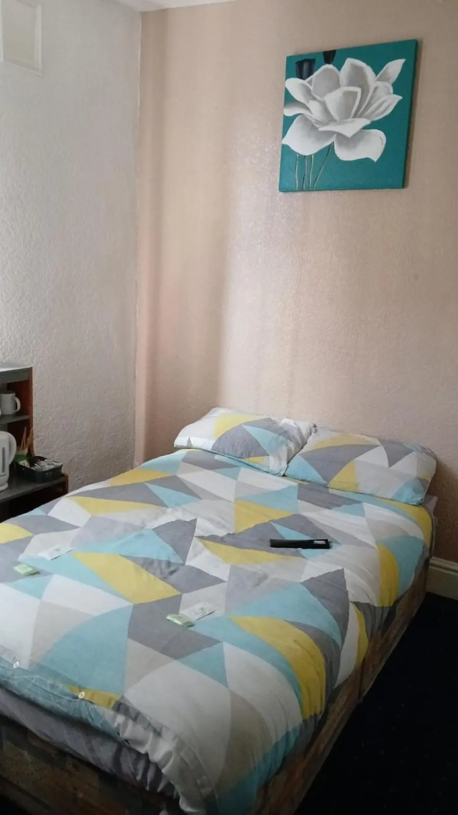 Bed in The Merlin Hotel