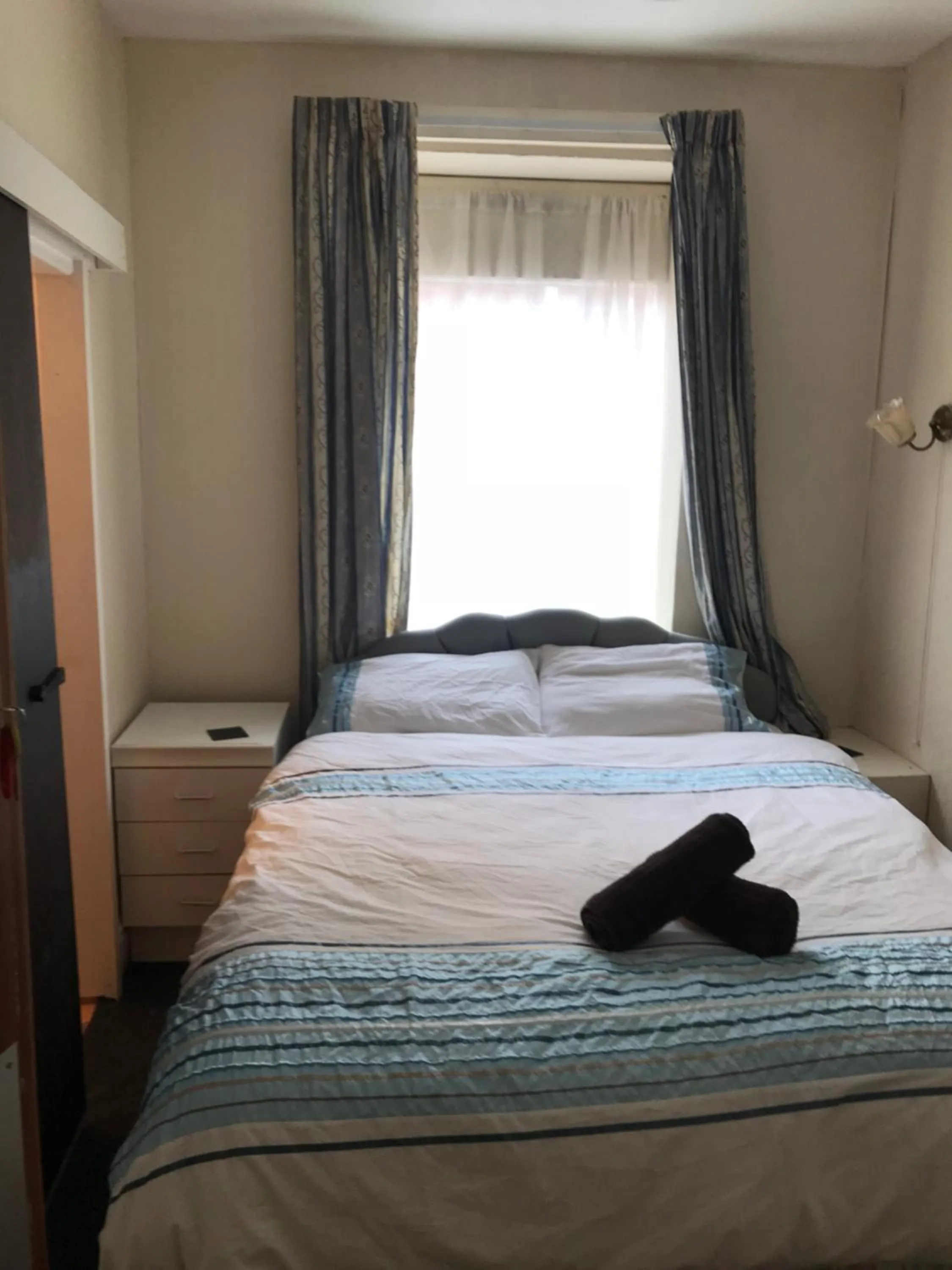 Bed in The Merlin Hotel