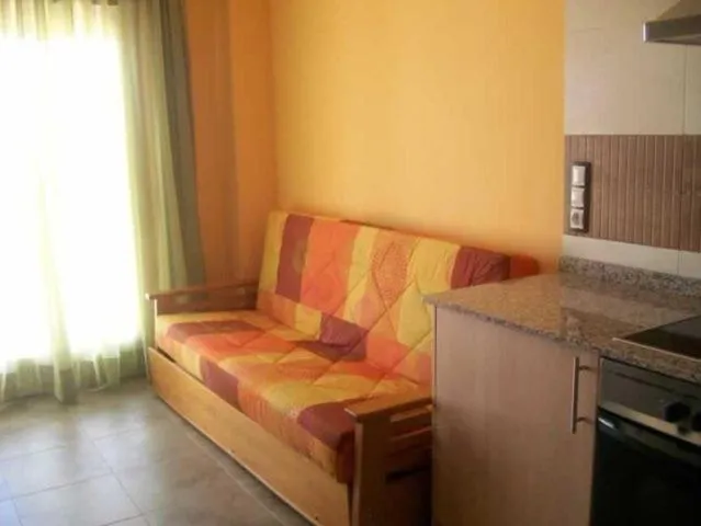 Seating area in Apartamentos Albamar II