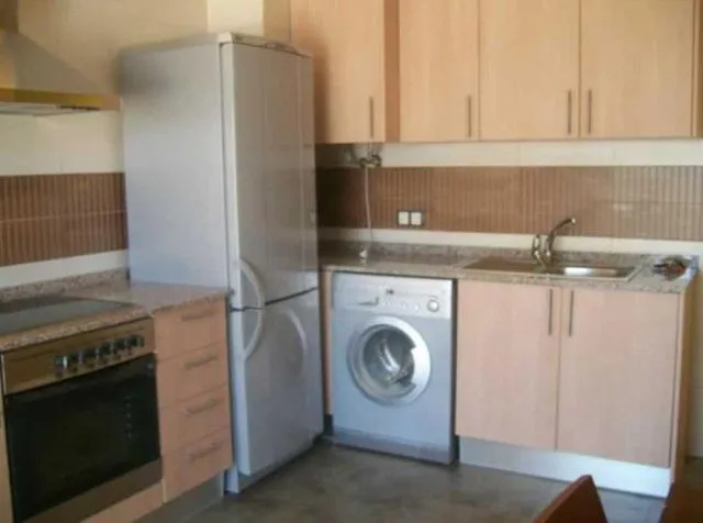 Kitchen or kitchenette in Apartamentos Albamar II