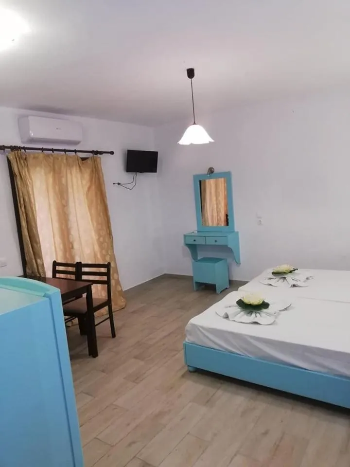 Bed in Gouvia House Luxury Apartments