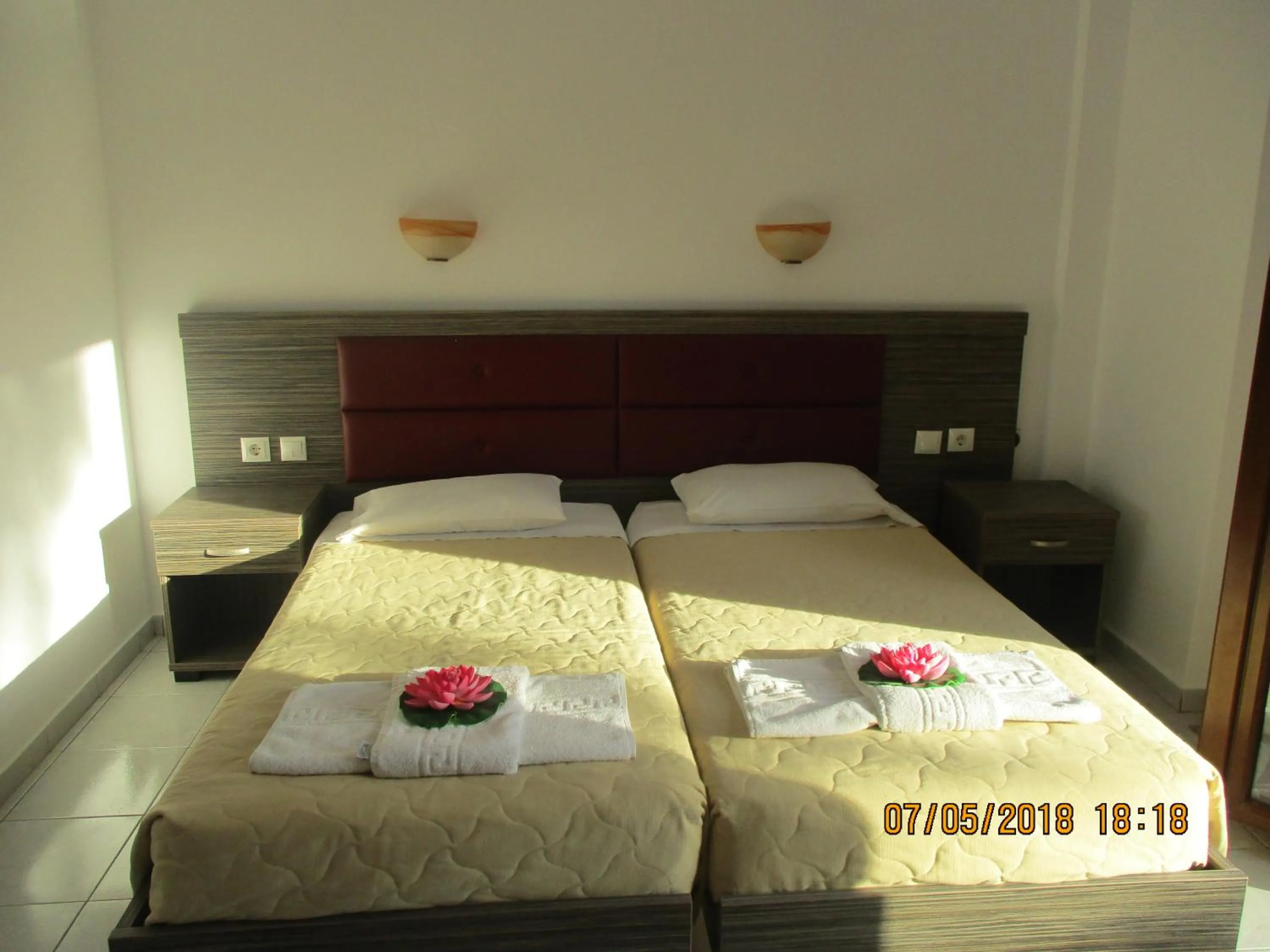 Bed in Gouvia House Luxury Apartments
