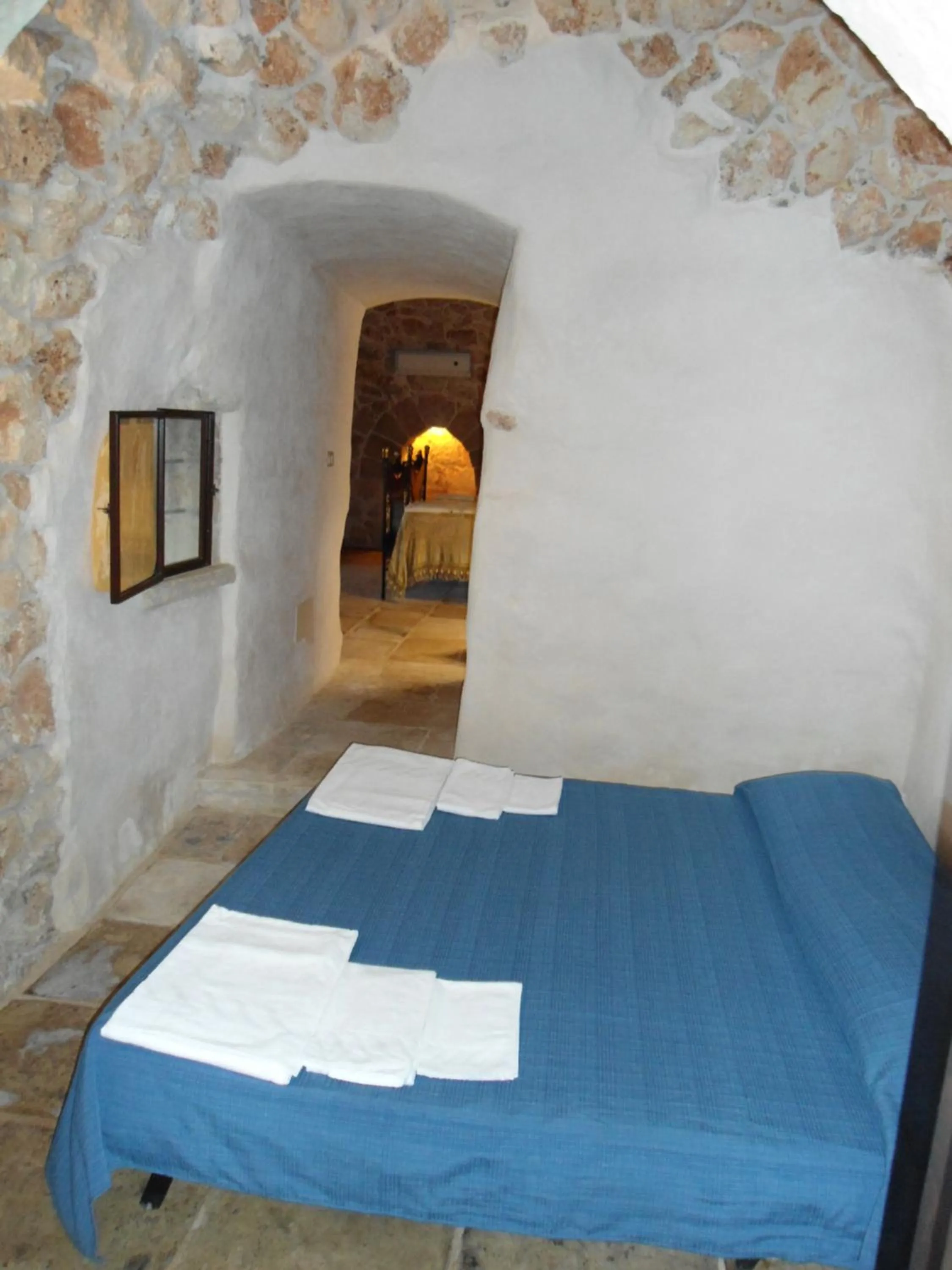 Decorative detail, Bed in Tenuta Pigliano Hotel