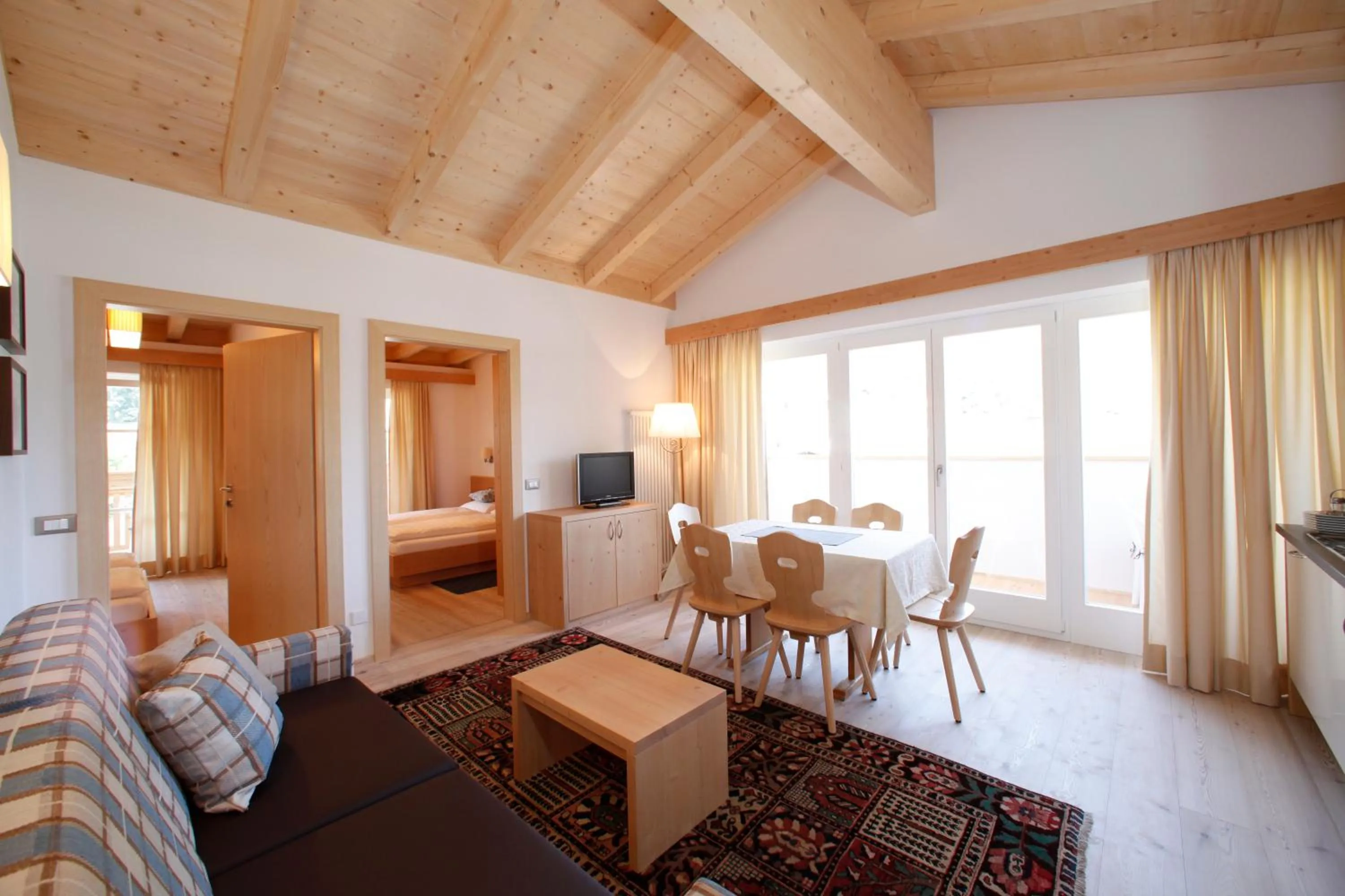 Living room, Bed in Christophorus Mountain Residence