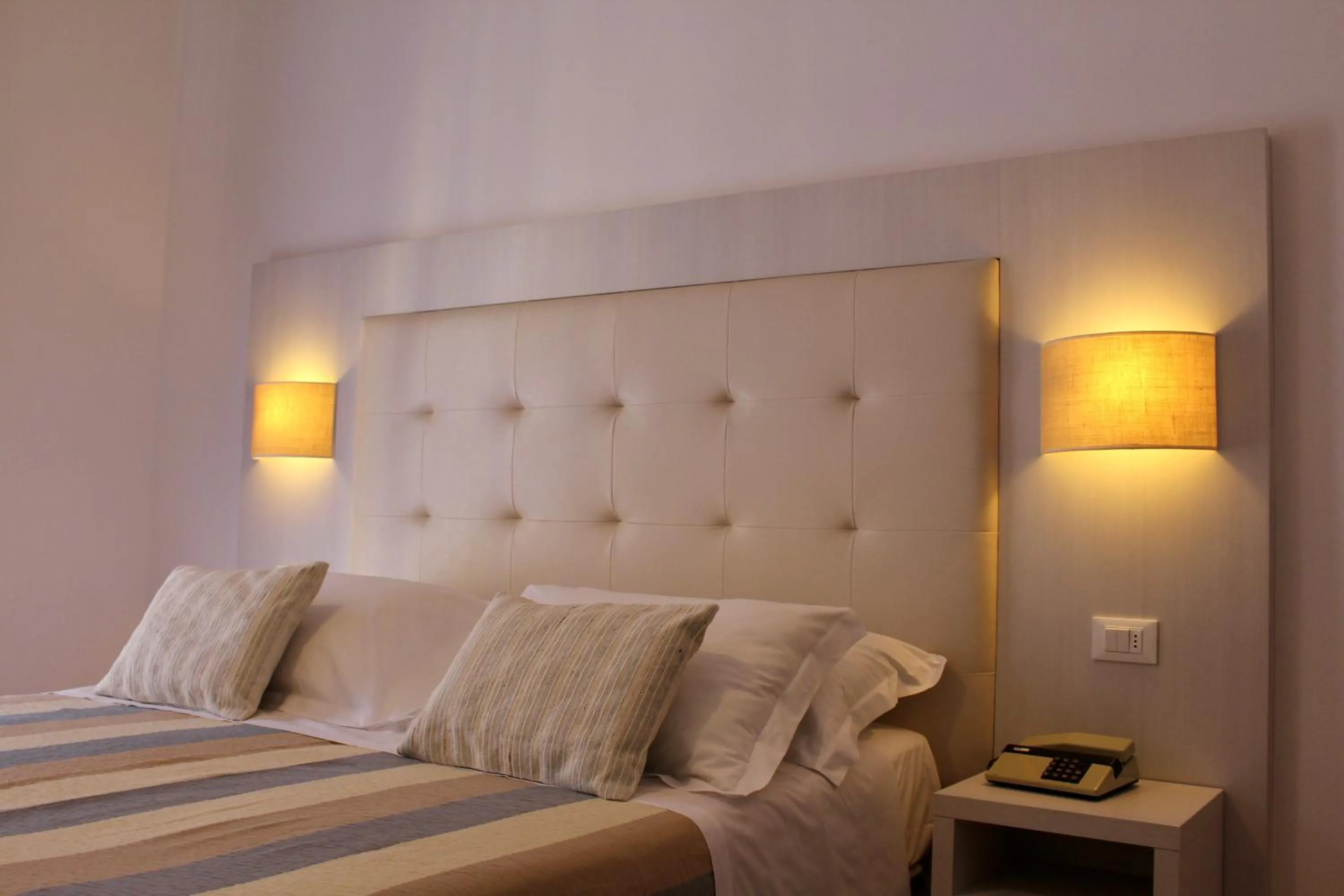 Bed in Albergo Degli Amici