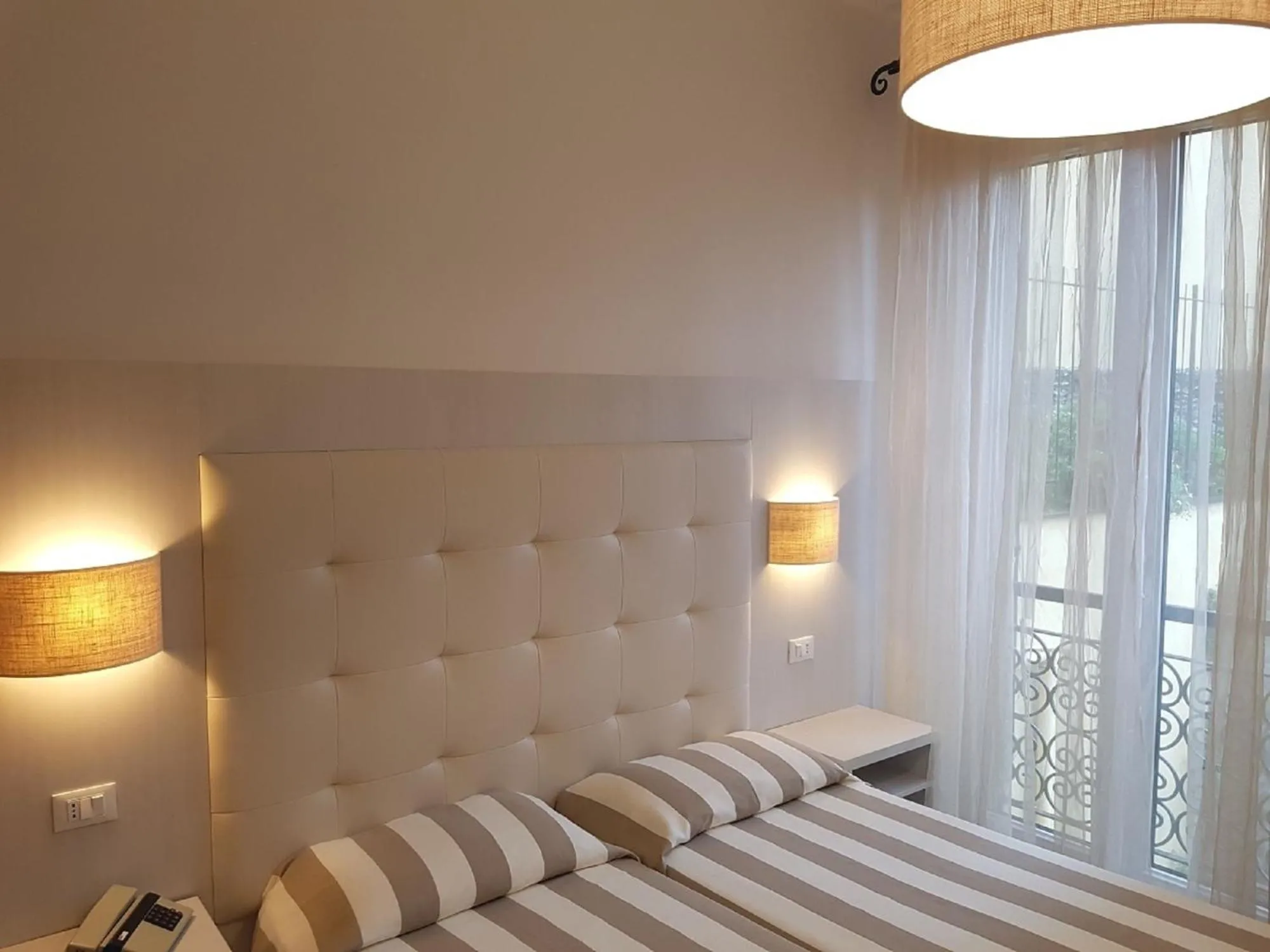 Bed in Albergo Degli Amici