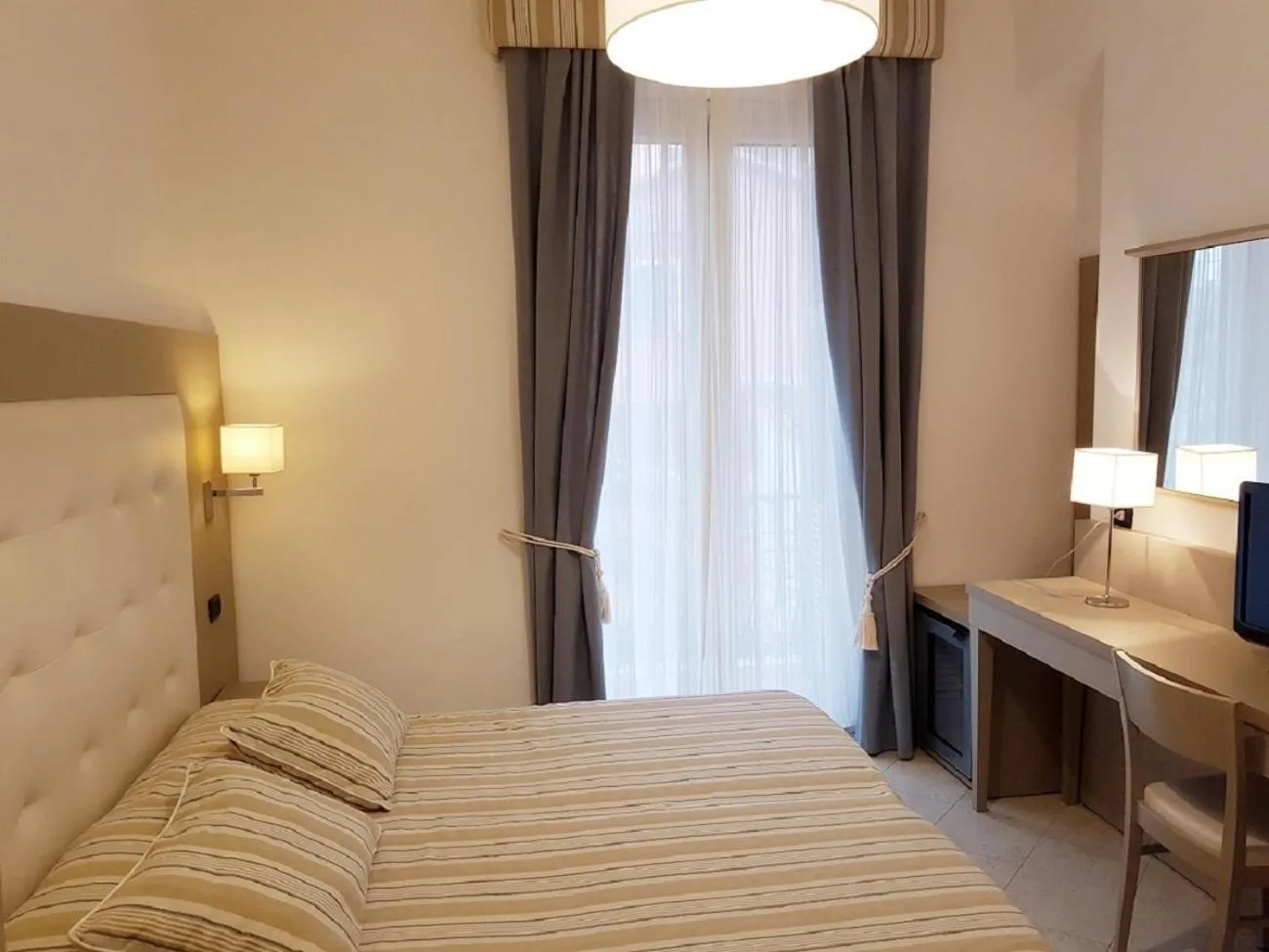 Bed in Albergo Degli Amici
