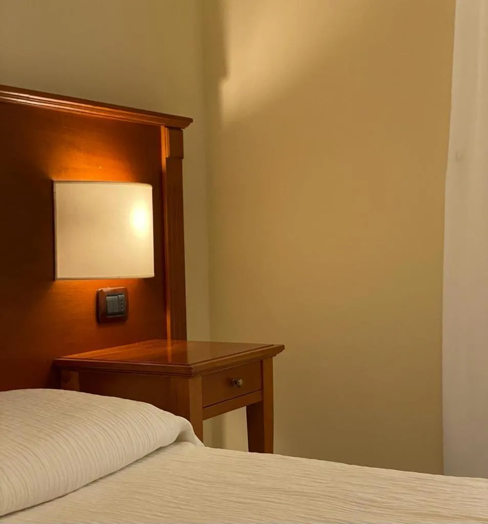 Bed in Albergo Degli Amici