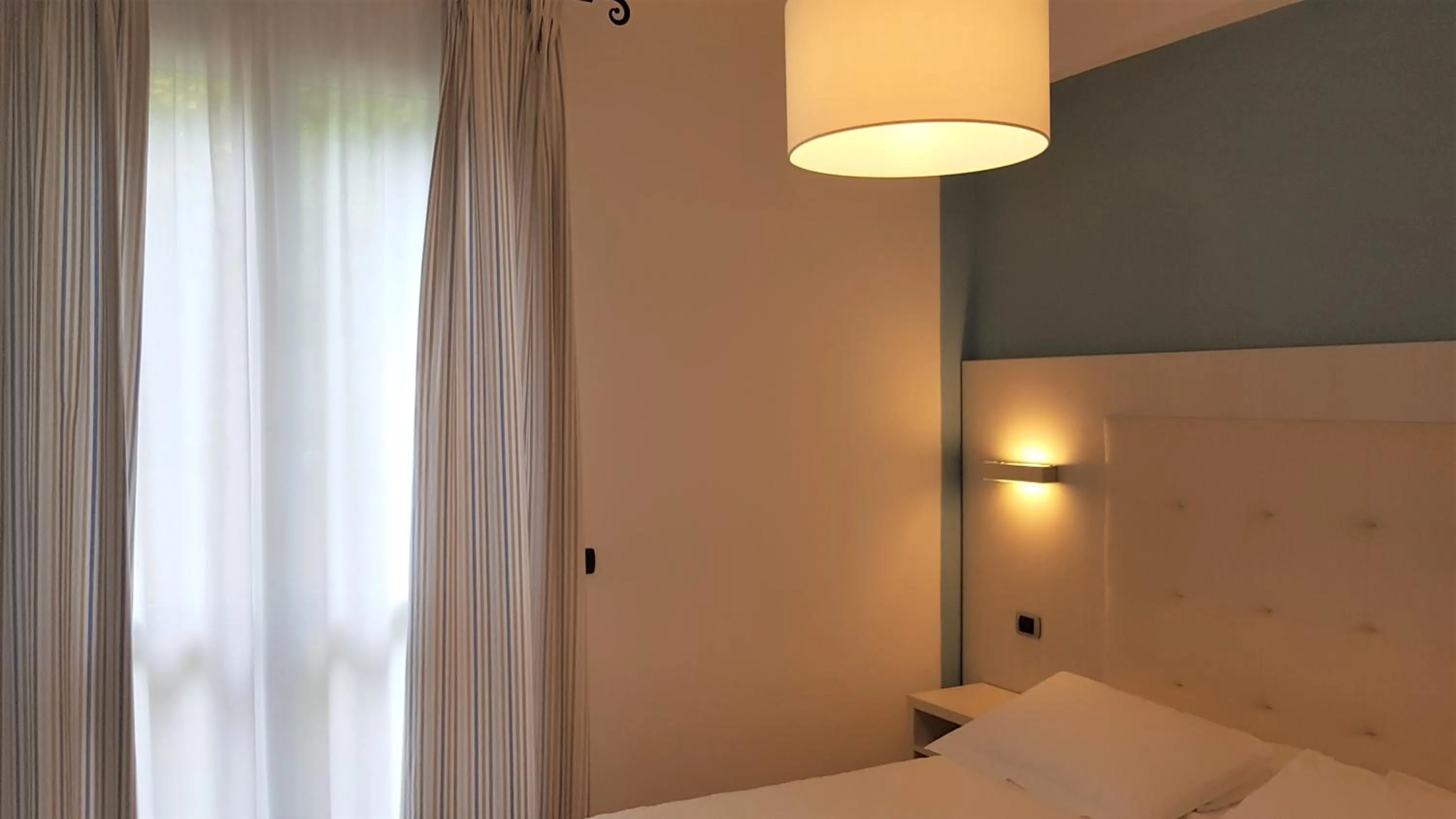 Bed in Albergo Degli Amici