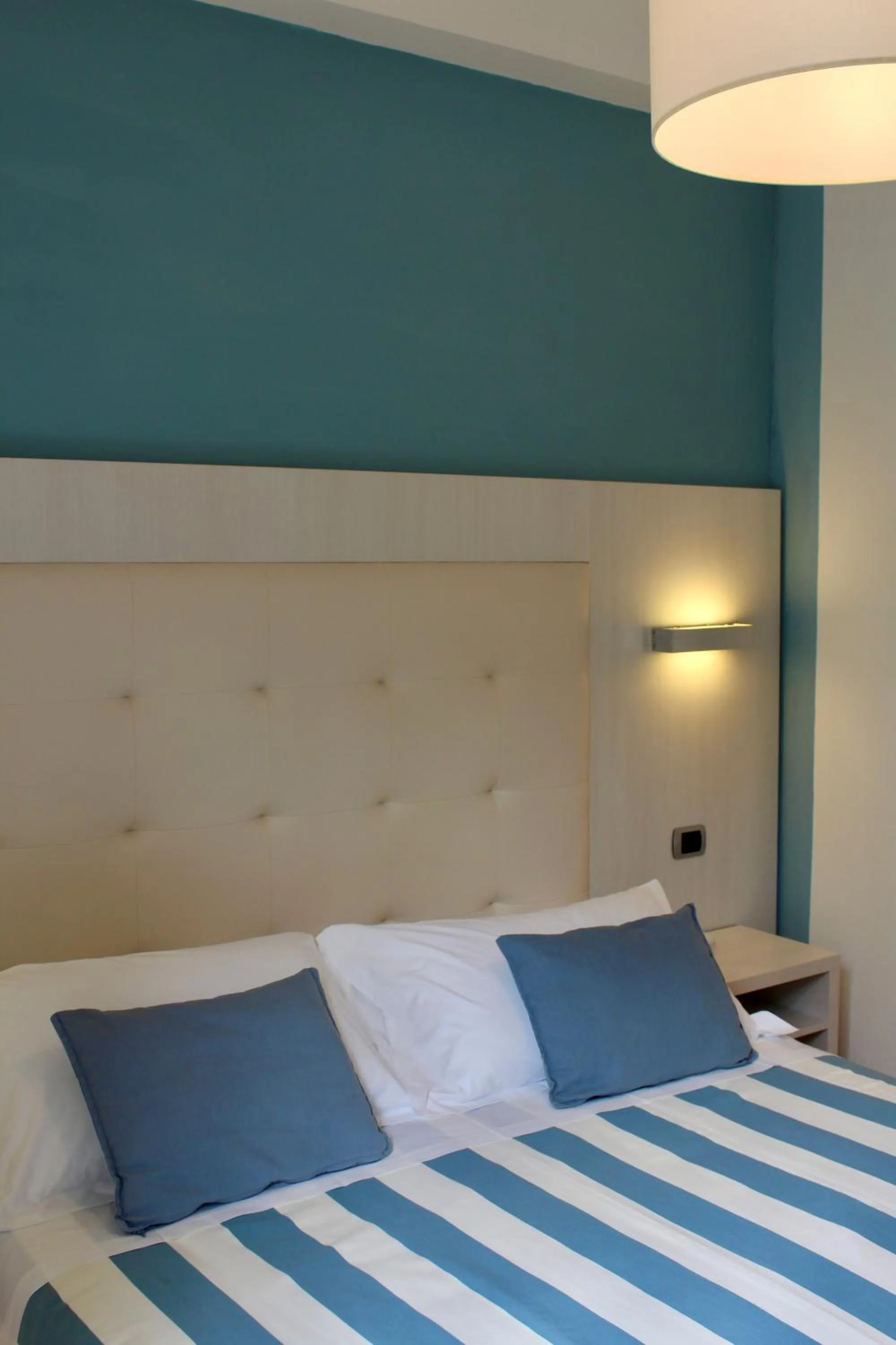 Bed in Albergo Degli Amici