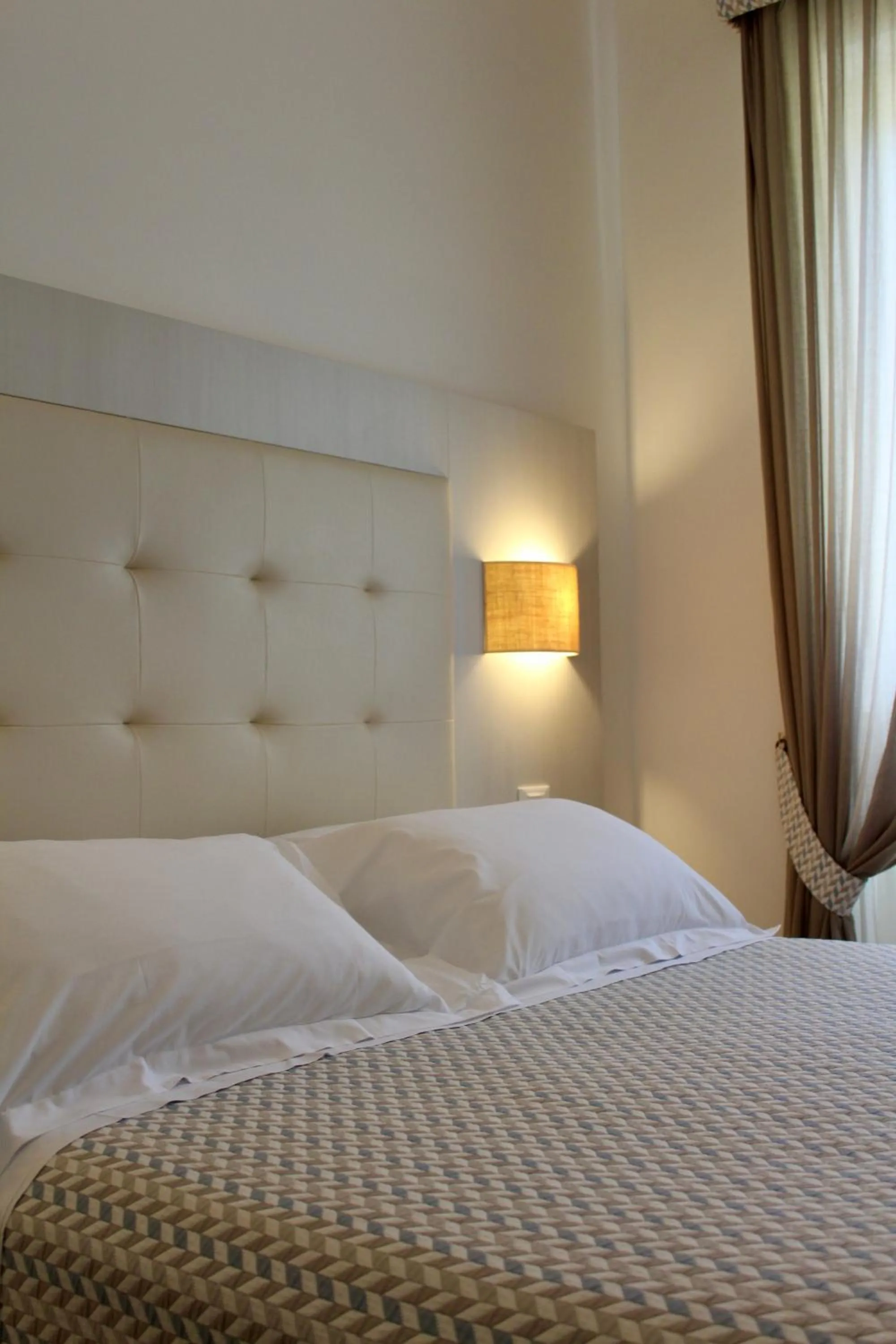 Bed in Albergo Degli Amici