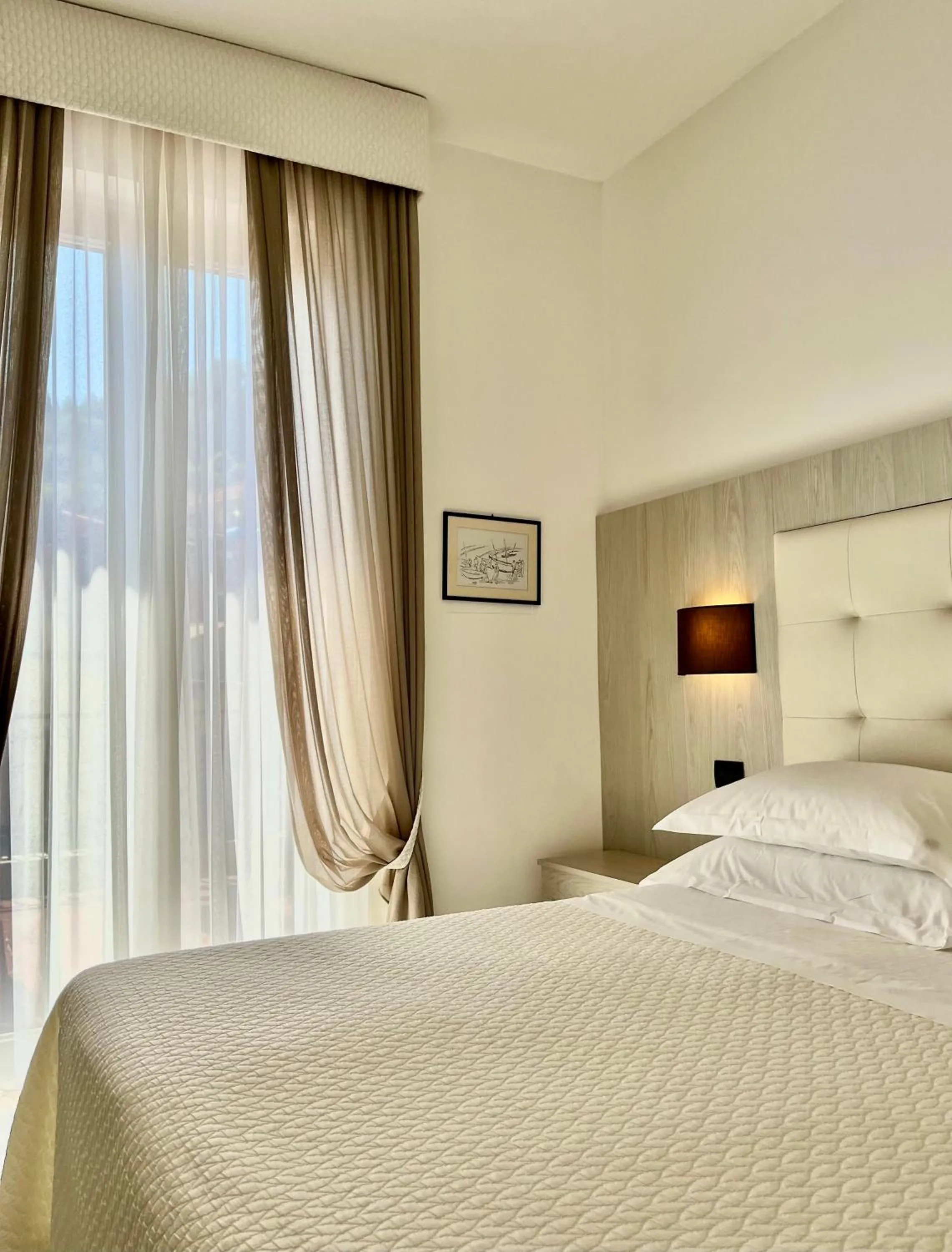 Bed in Albergo Degli Amici