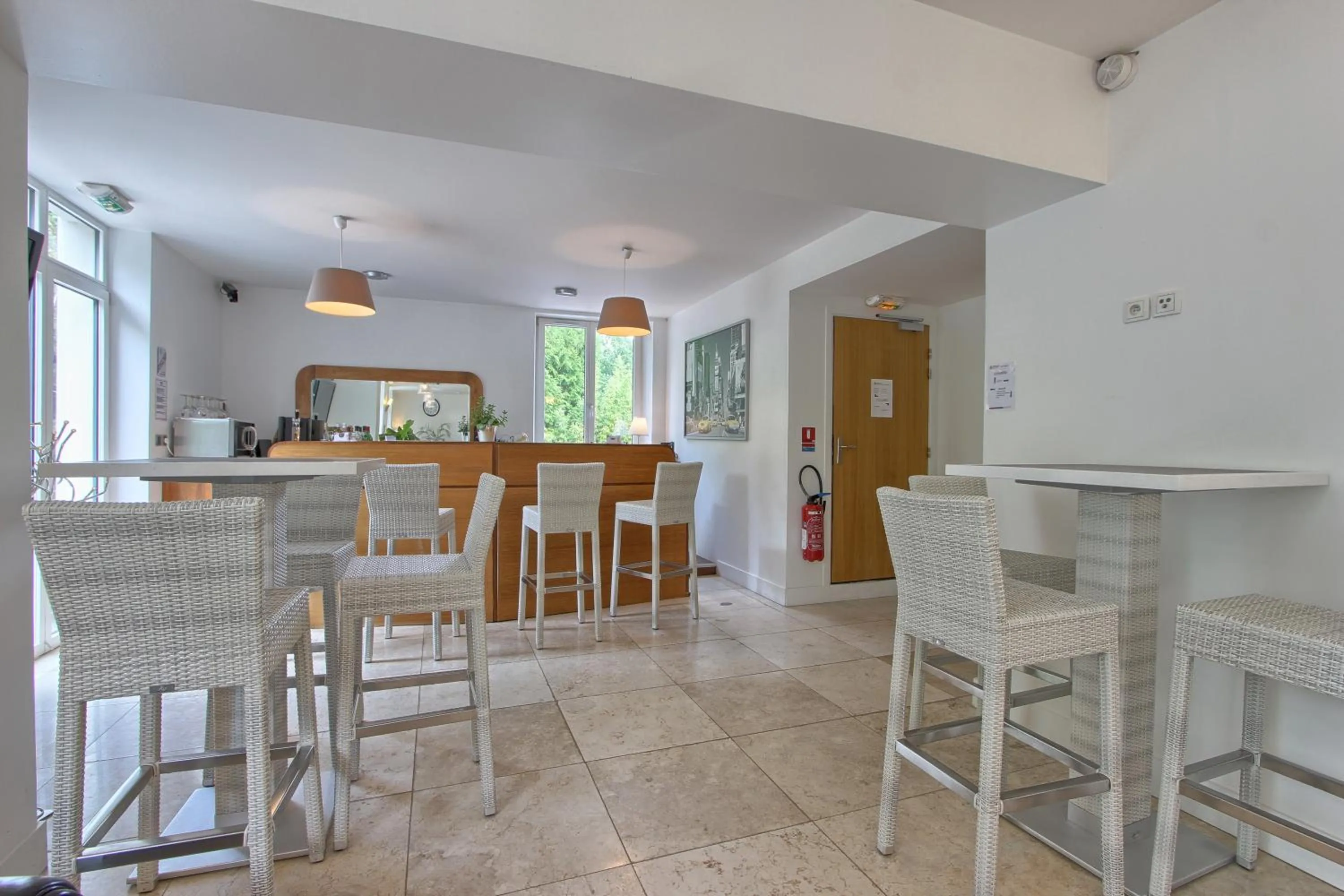 Lounge or bar in Logis Hôtel - Le Manoir de Sauvegrain