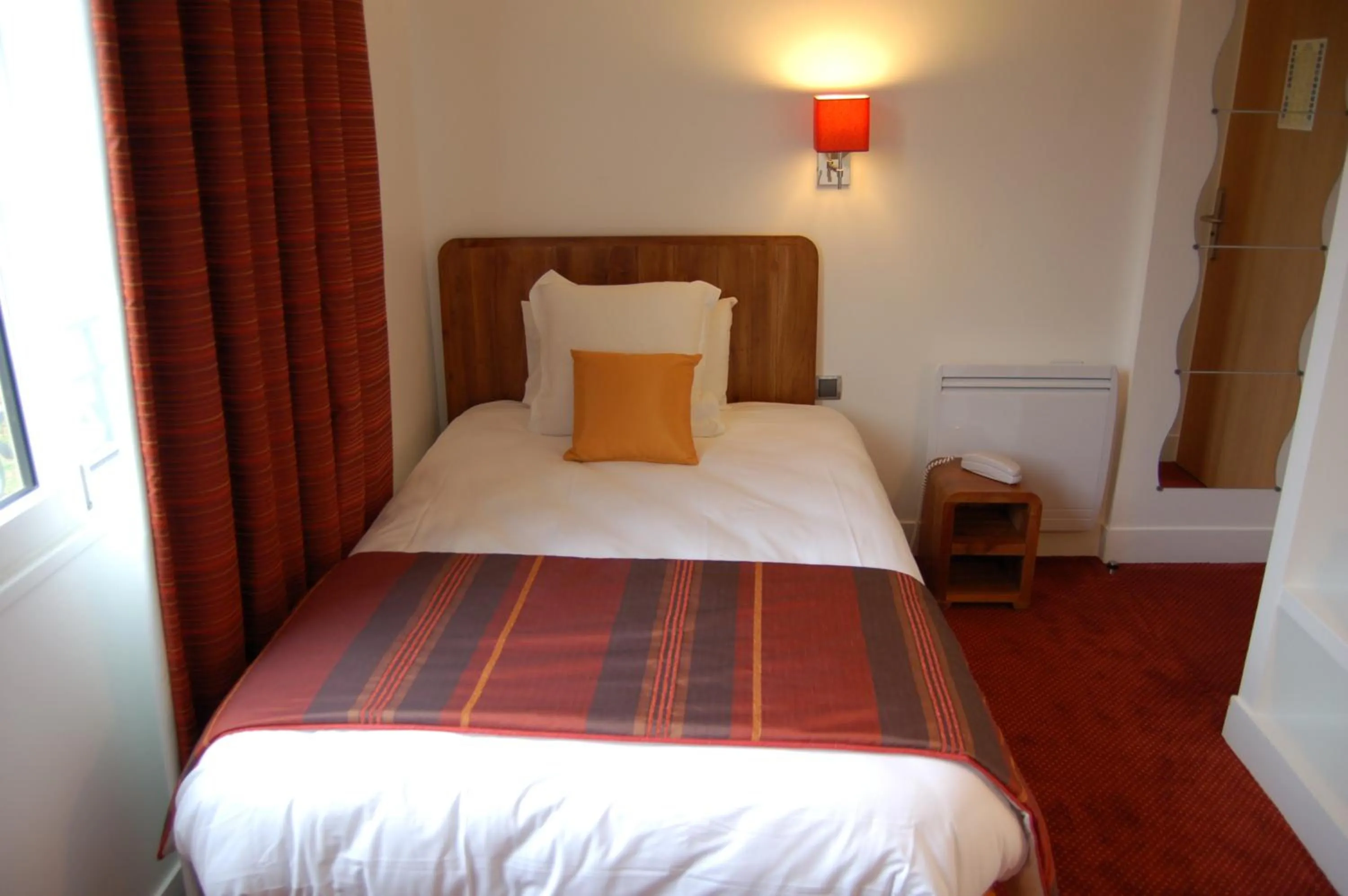 Bed in Logis Hôtel - Le Manoir de Sauvegrain