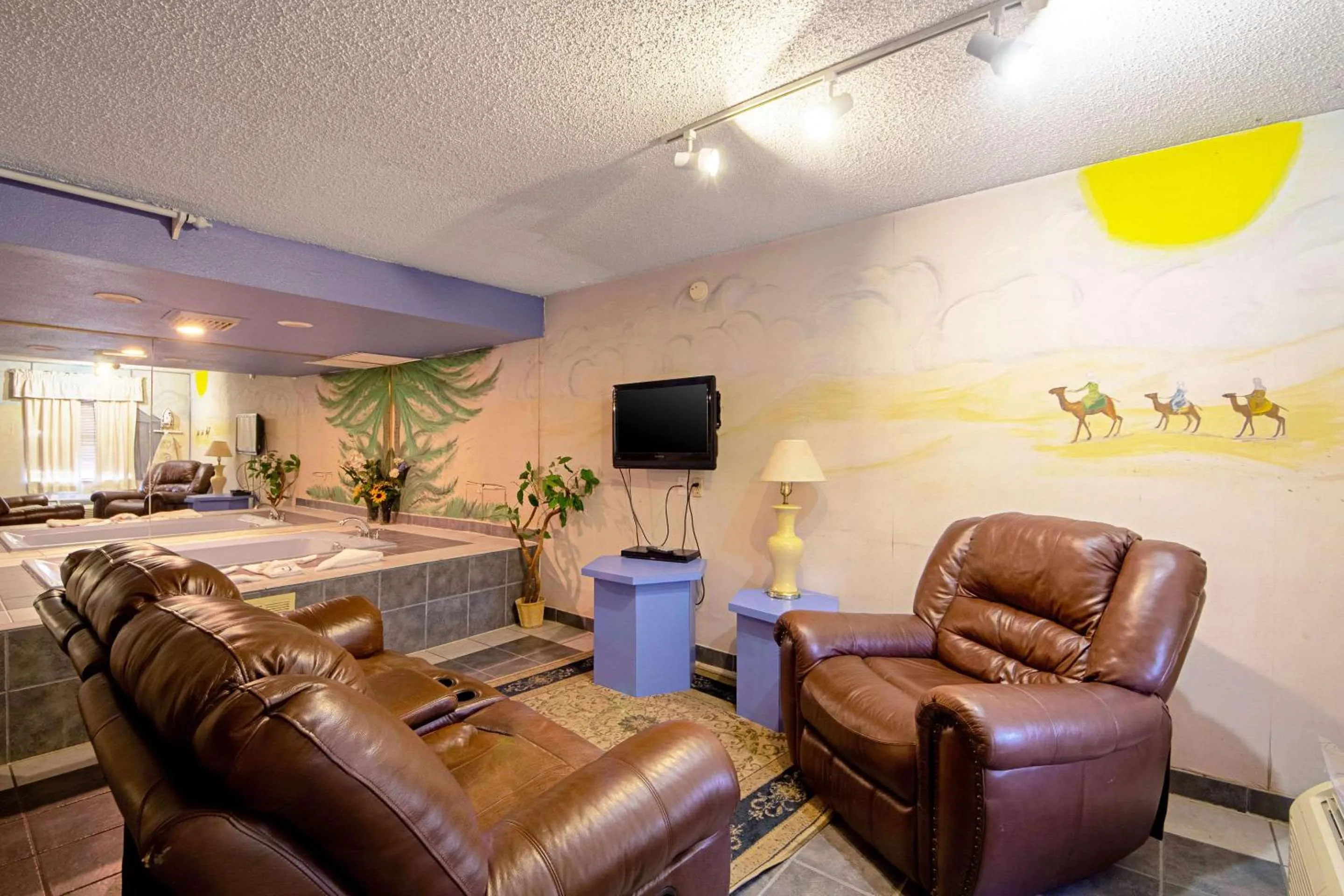 Photo of the whole room, Bed in Economy Inn & Suites