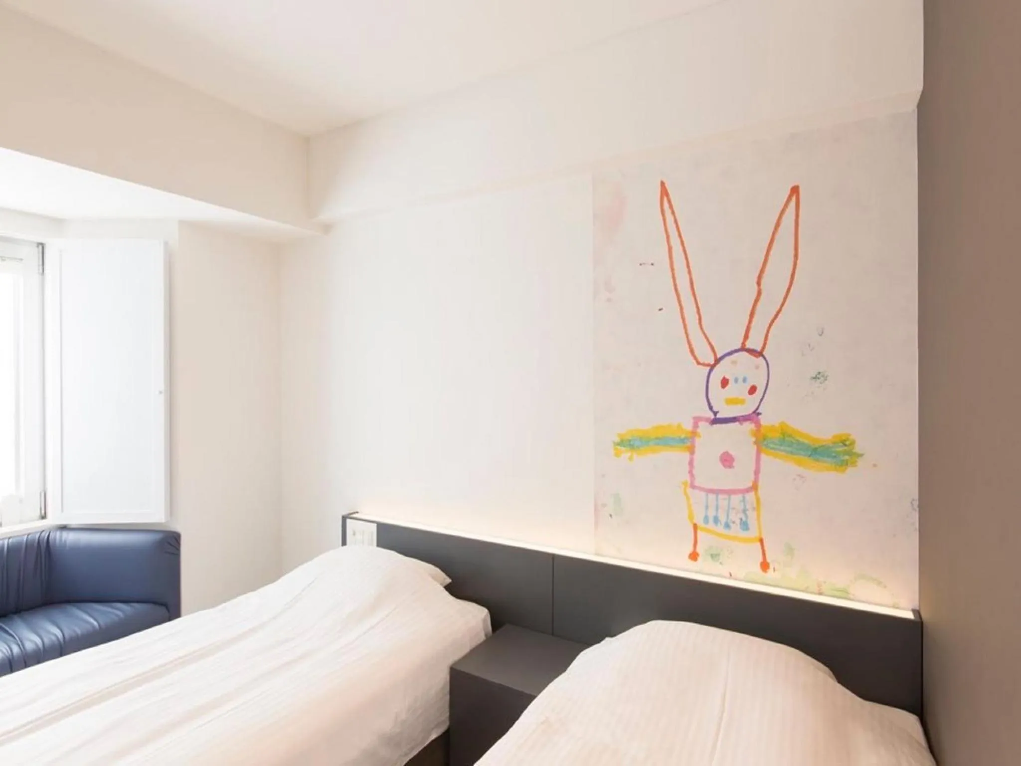 Photo of the whole room, Bed in Hotel Art Stay Naha Kokusai-Dori