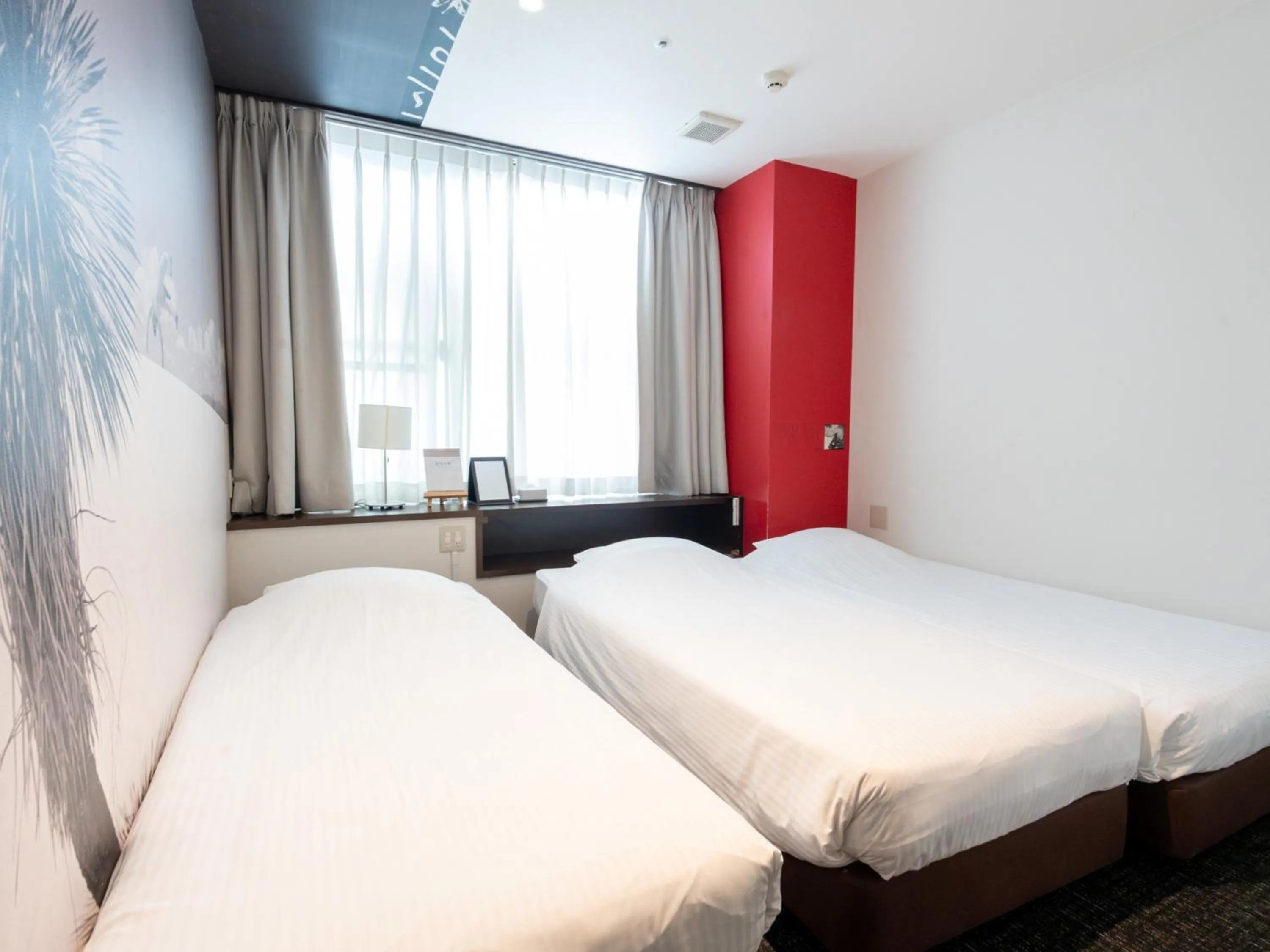 Photo of the whole room, Bed in Hotel Art Stay Naha Kokusai-Dori