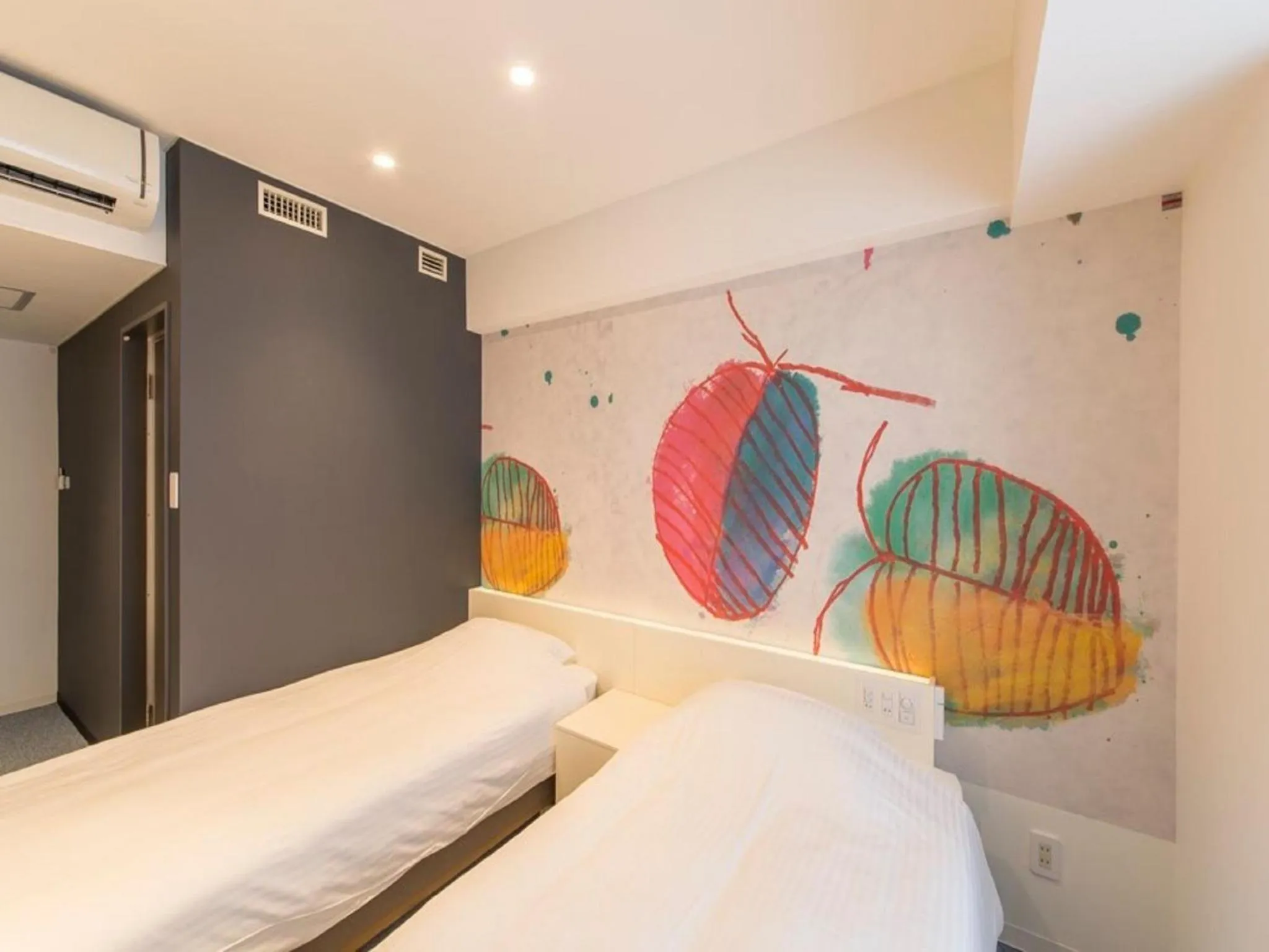 Photo of the whole room, Bed in Hotel Art Stay Naha Kokusai-Dori