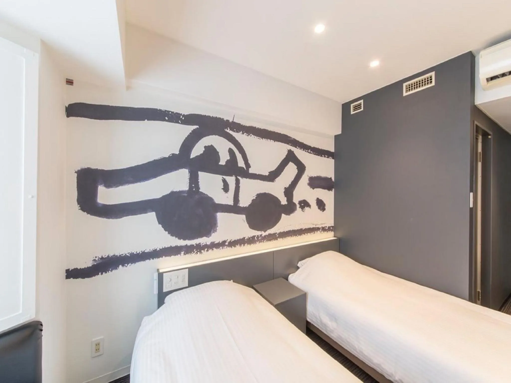 Photo of the whole room, Bed in Hotel Art Stay Naha Kokusai-Dori