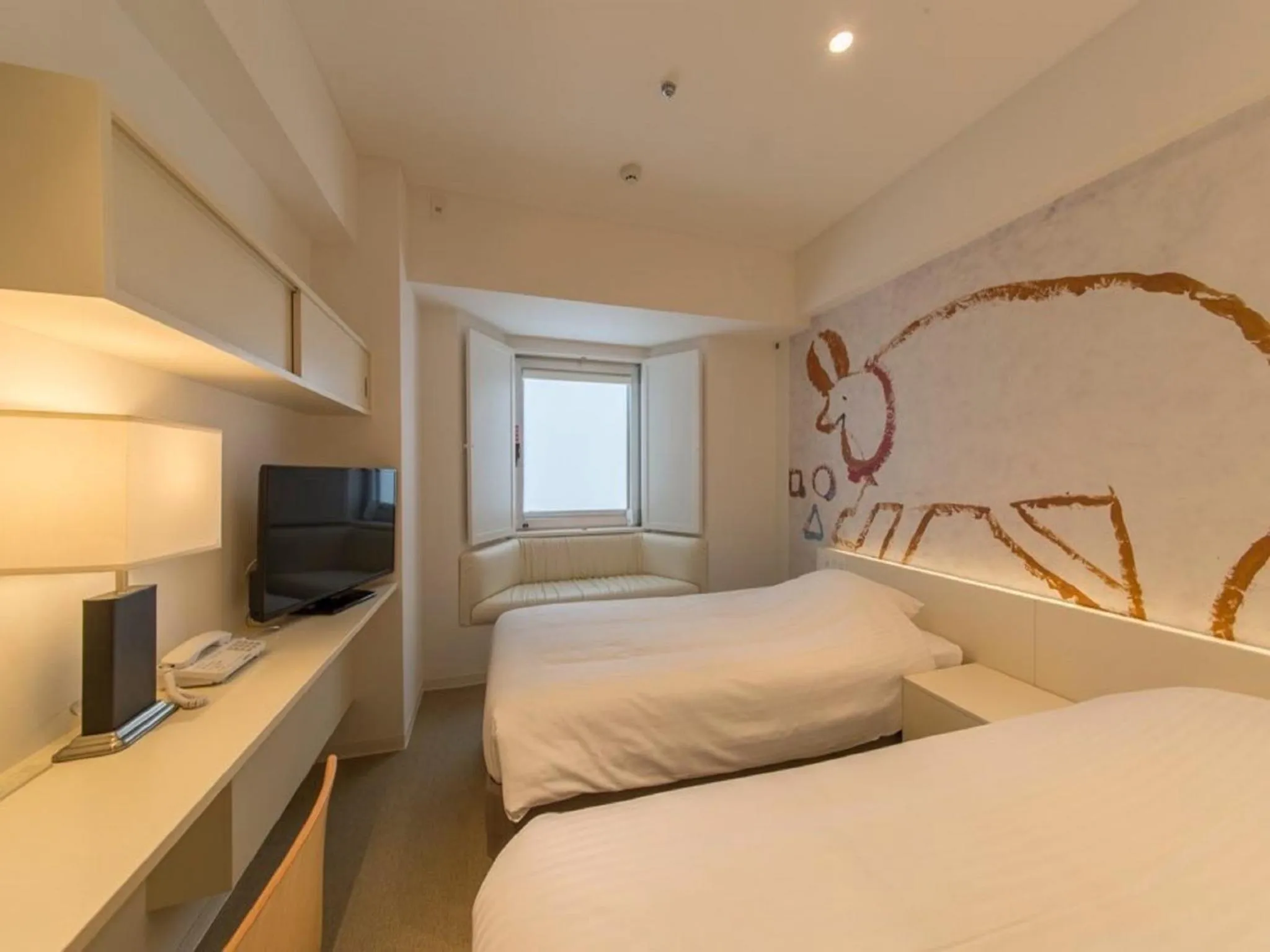 Photo of the whole room, Bed in Hotel Art Stay Naha Kokusai-Dori