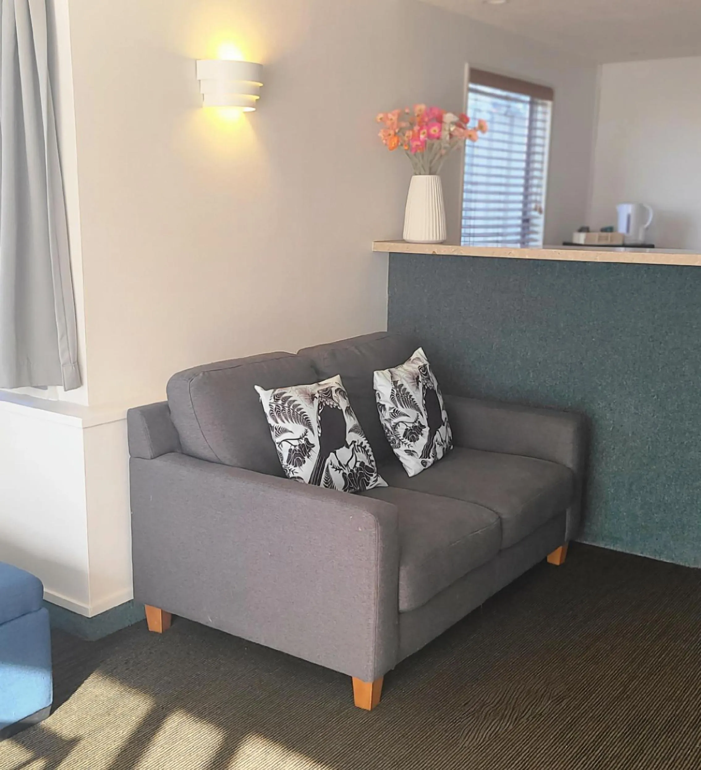 Living room in BK's Fountain Court Motel