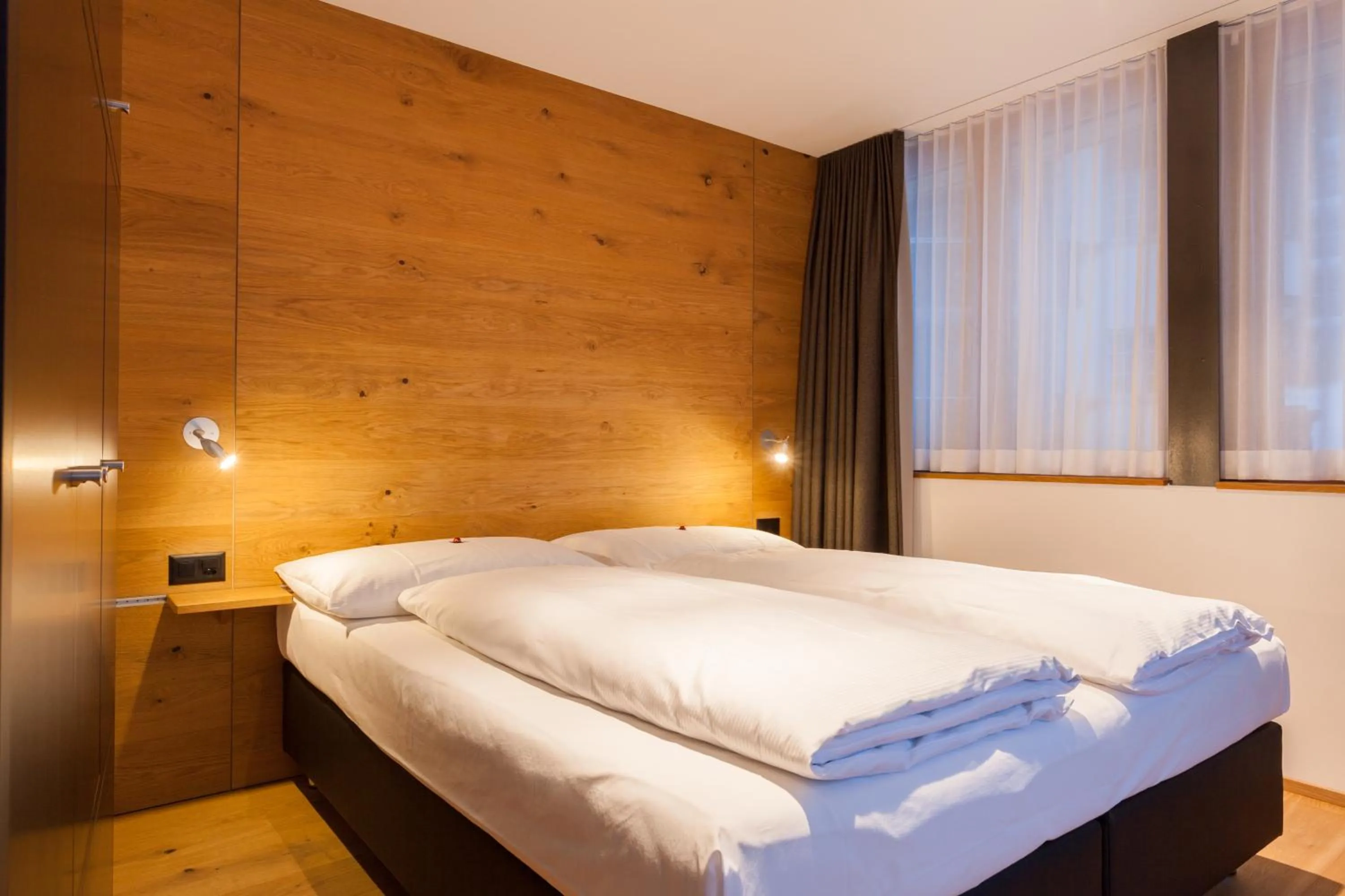 Bedroom, Bed in Elite Alpine Lodge - Apart & Breakfast