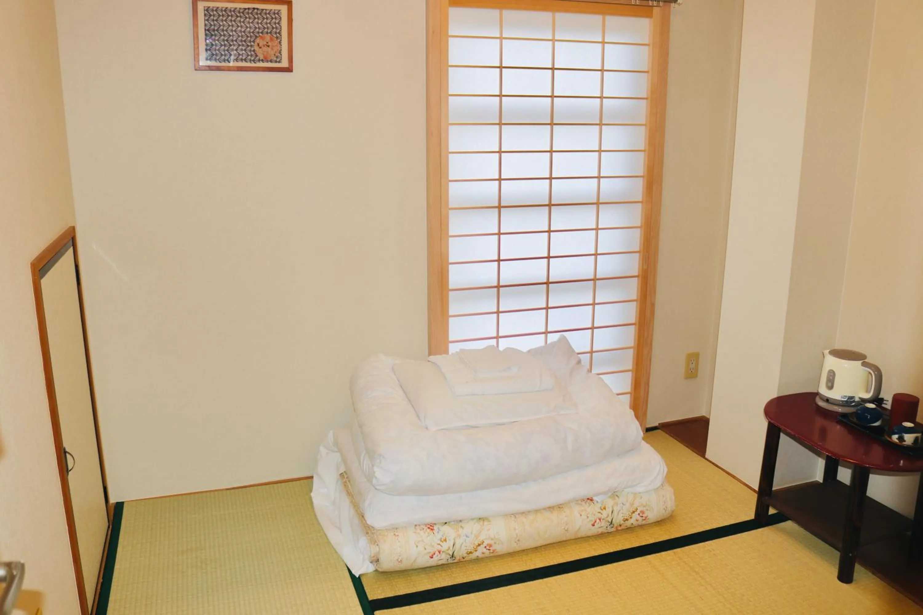Bed in Ikoi-no-Ie Guesthouse
