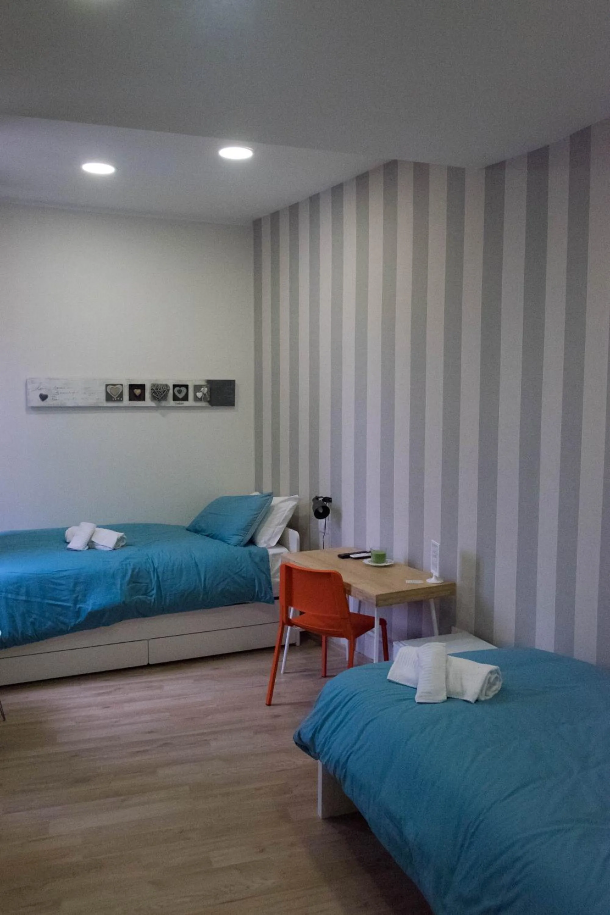 Bed in 2Naples Rooms