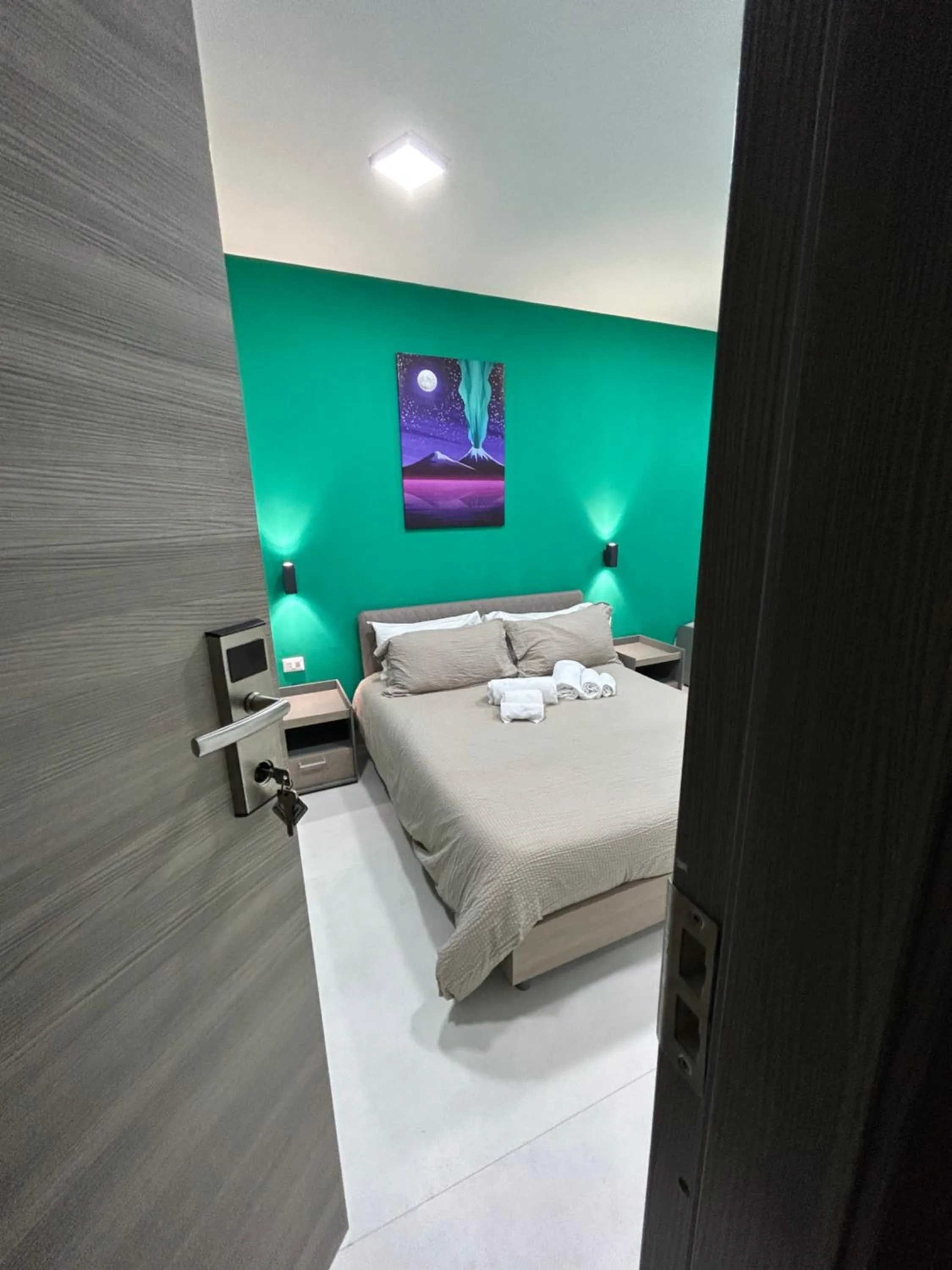 Bed in 2Naples Rooms