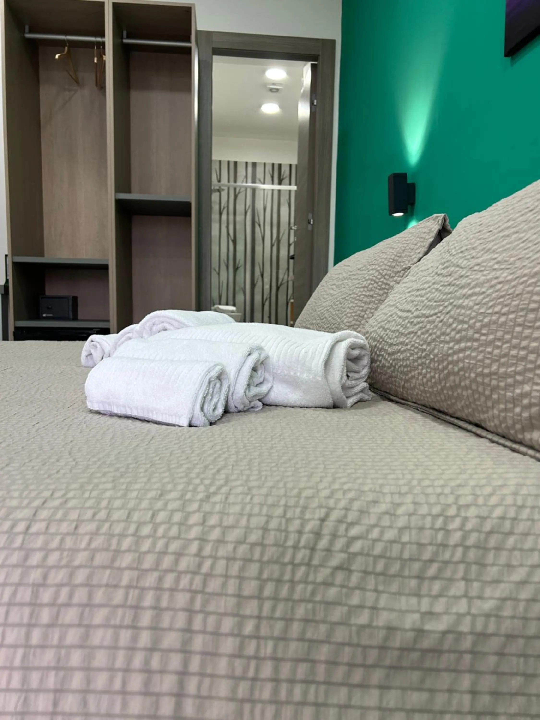 Bed in 2Naples Rooms