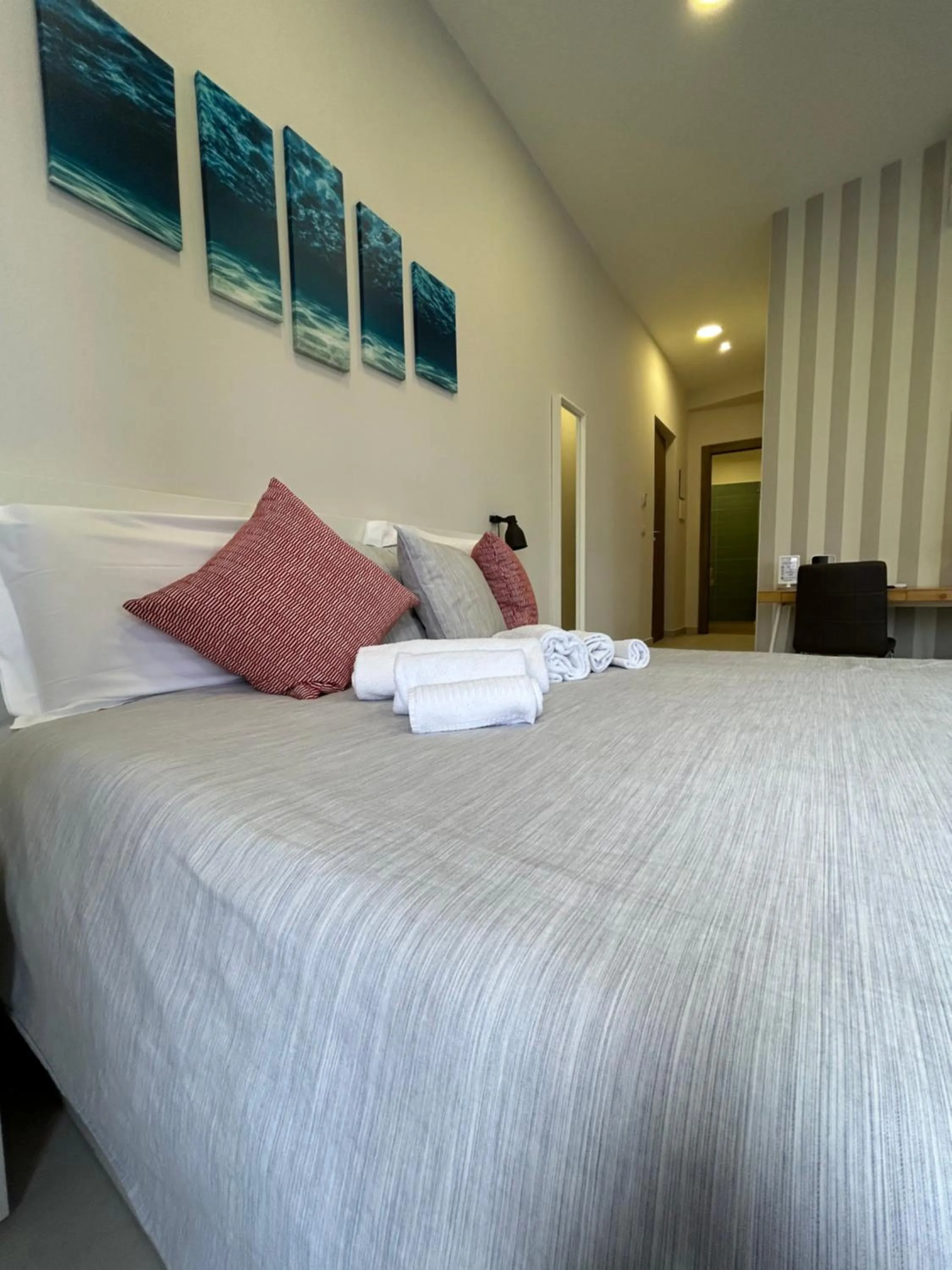 Bed in 2Naples Rooms