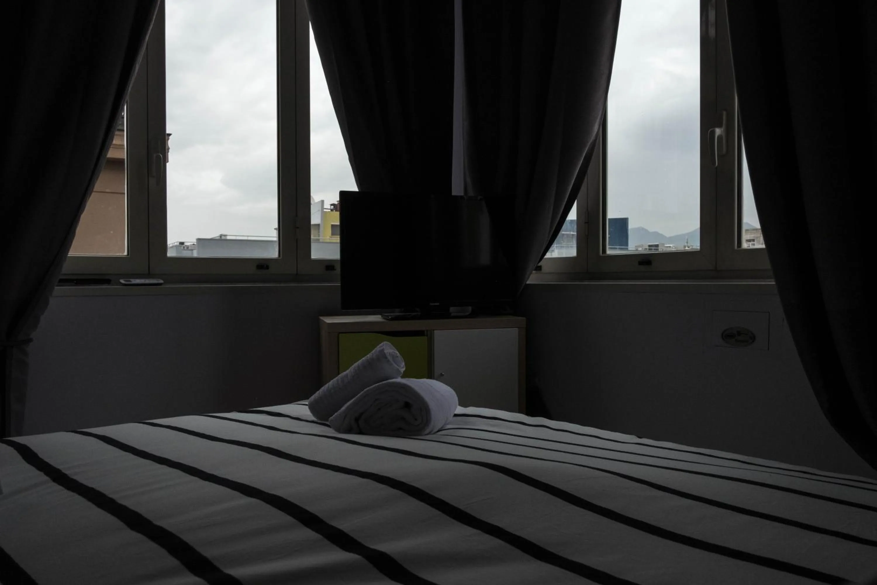 Bed in 2Naples Rooms