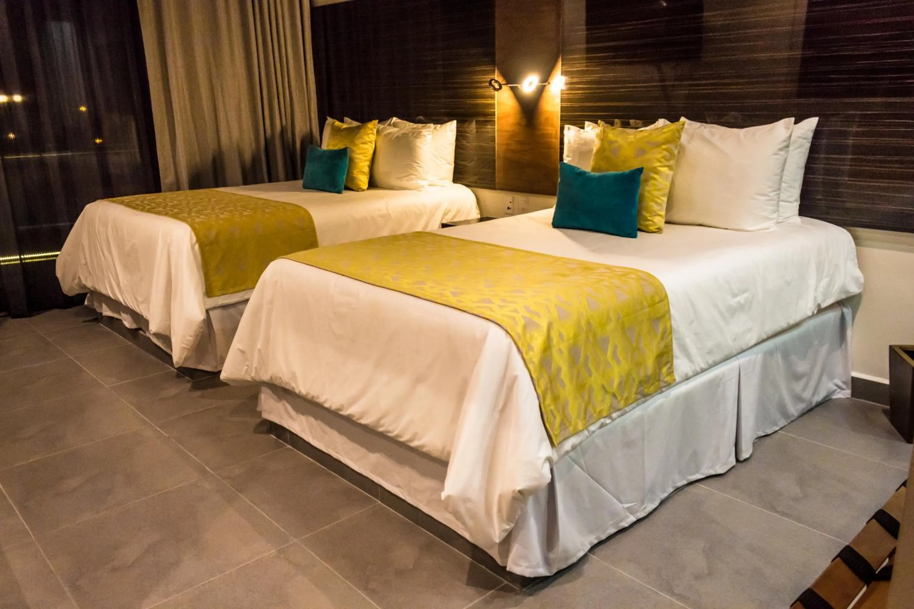 Photo of the whole room, Bed in KABAH Cancun Hotel Boutique
