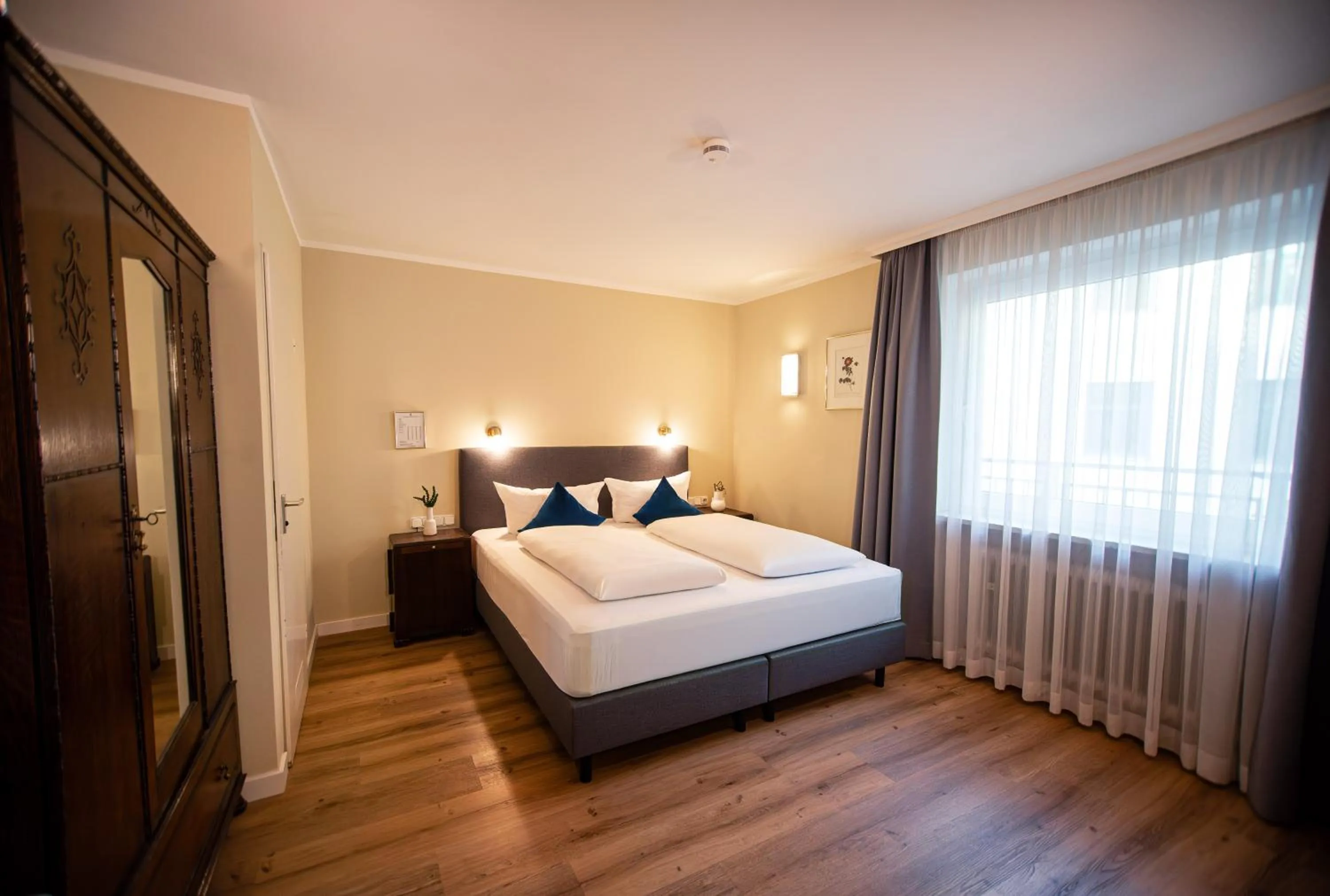 Bed in Hotel Altmünchen by Blattl