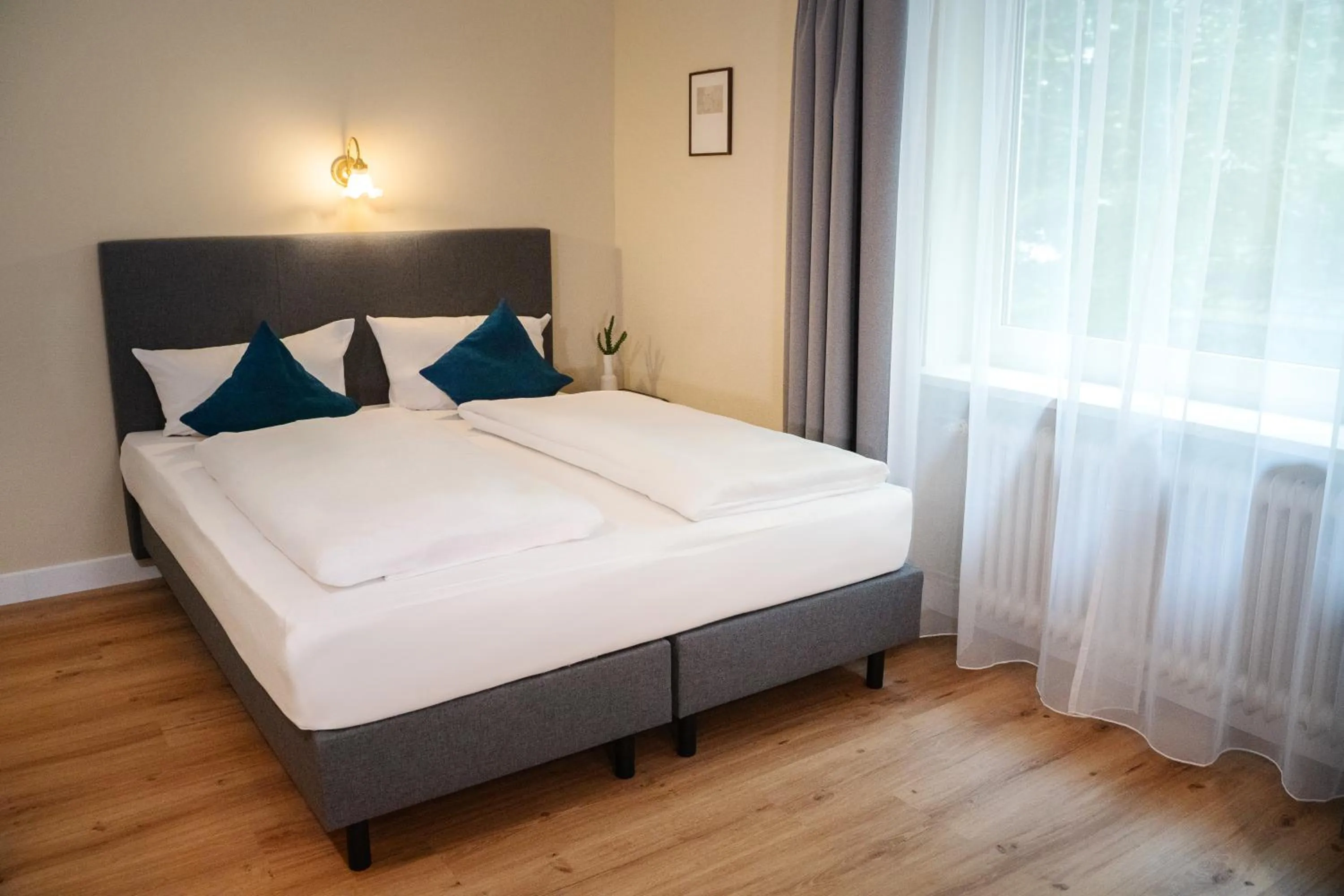 Bed in Hotel Altmünchen by Blattl