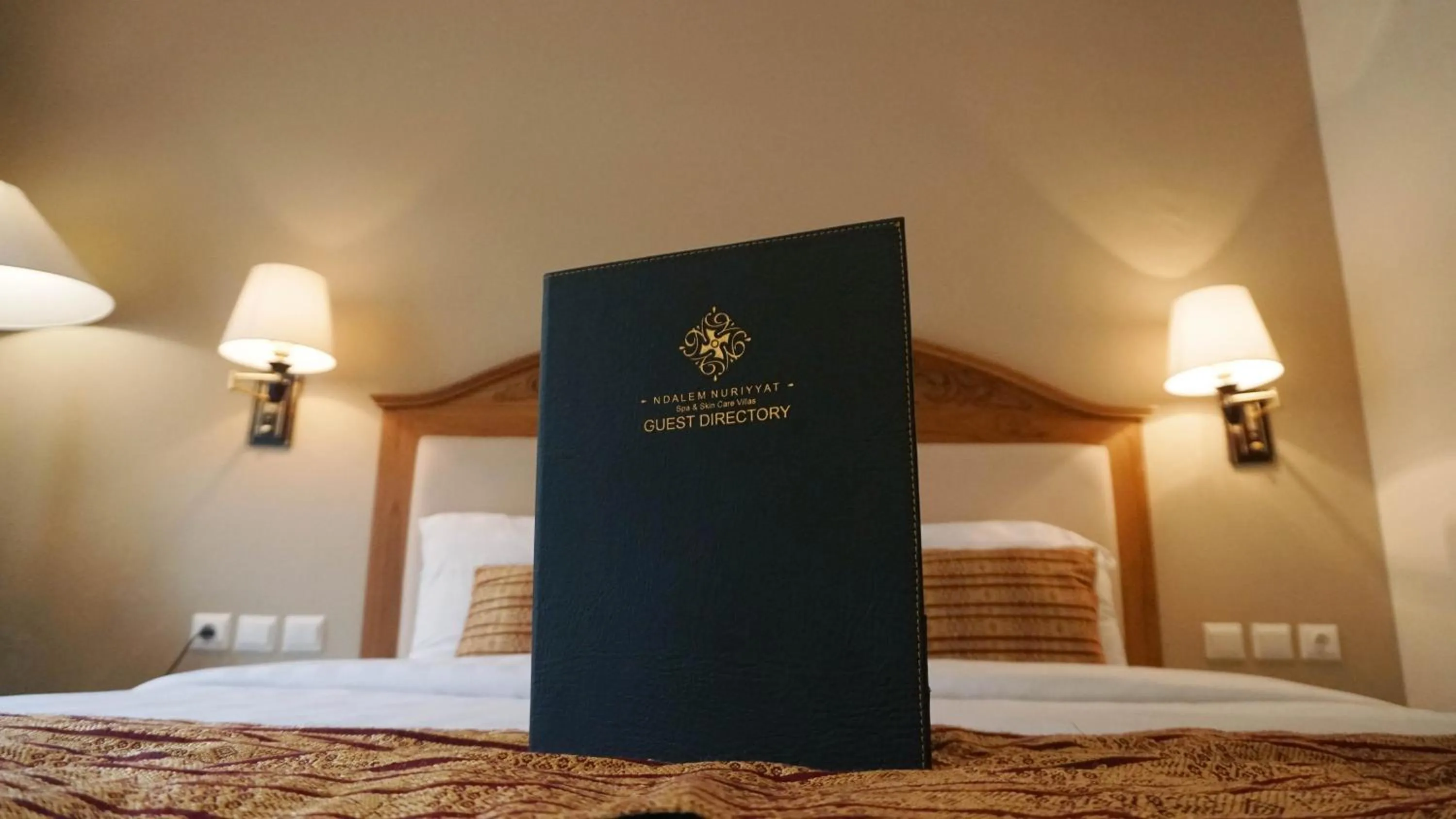 Property logo or sign, Bed in Ndalem Nuriyyat Villa, Spa & Skin Care