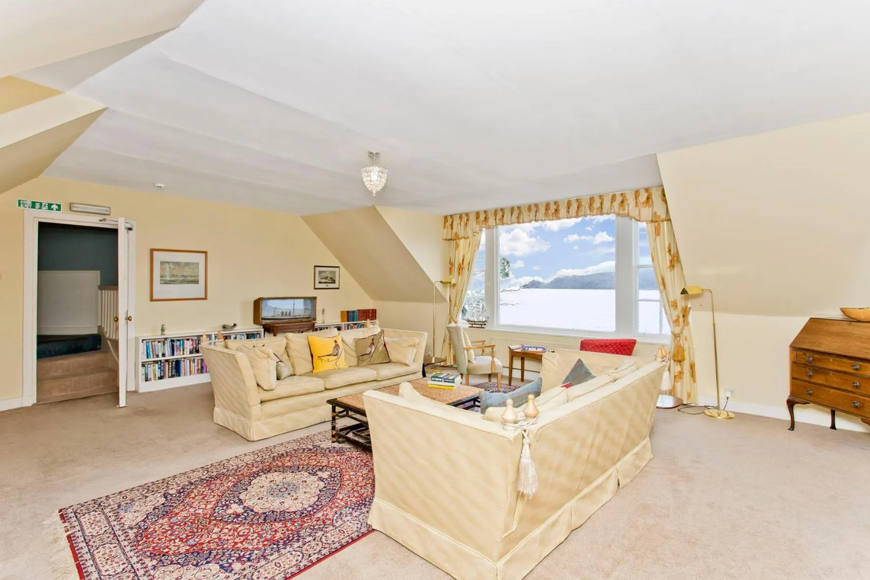 Communal lounge/ TV room in The Creggans Inn