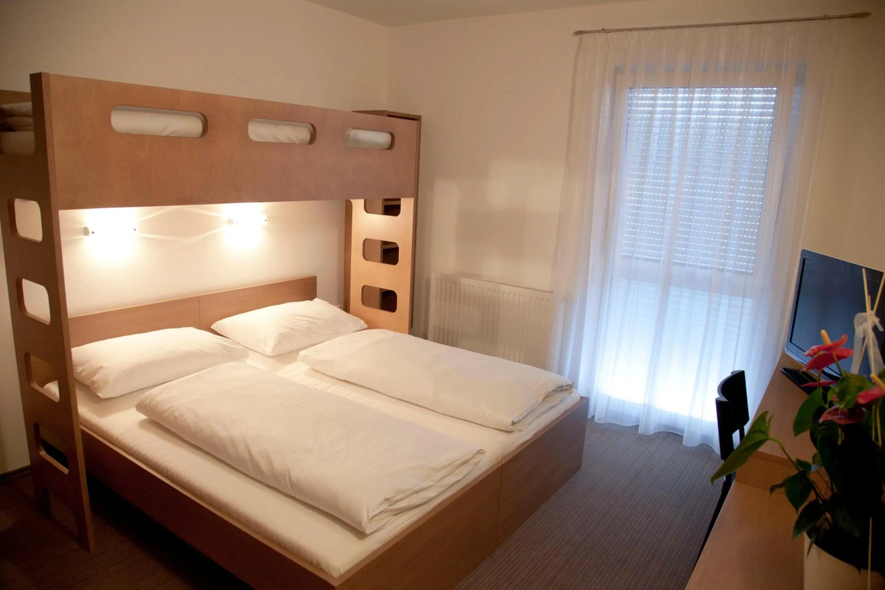 Bed in Fair-Price-Hotel