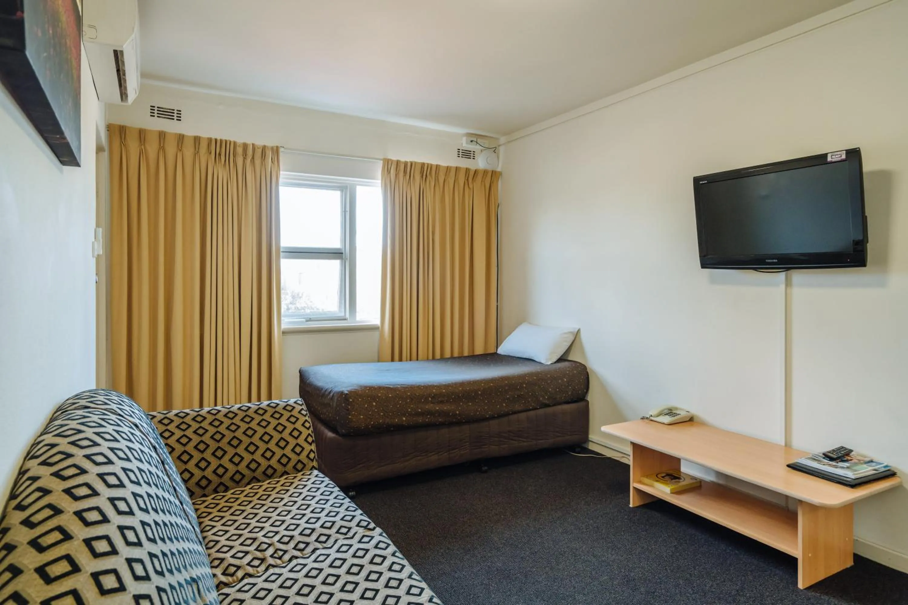 Bed in Canning Bridge Auto Lodge