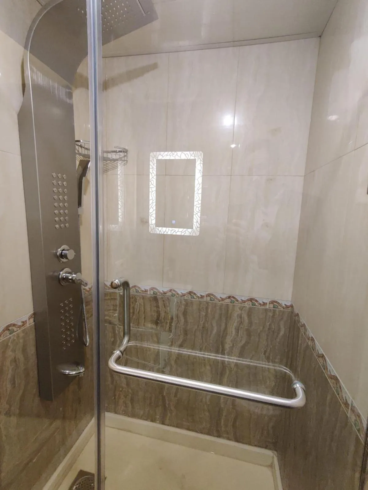 Shower in Bliss 3000 Furnished Studios