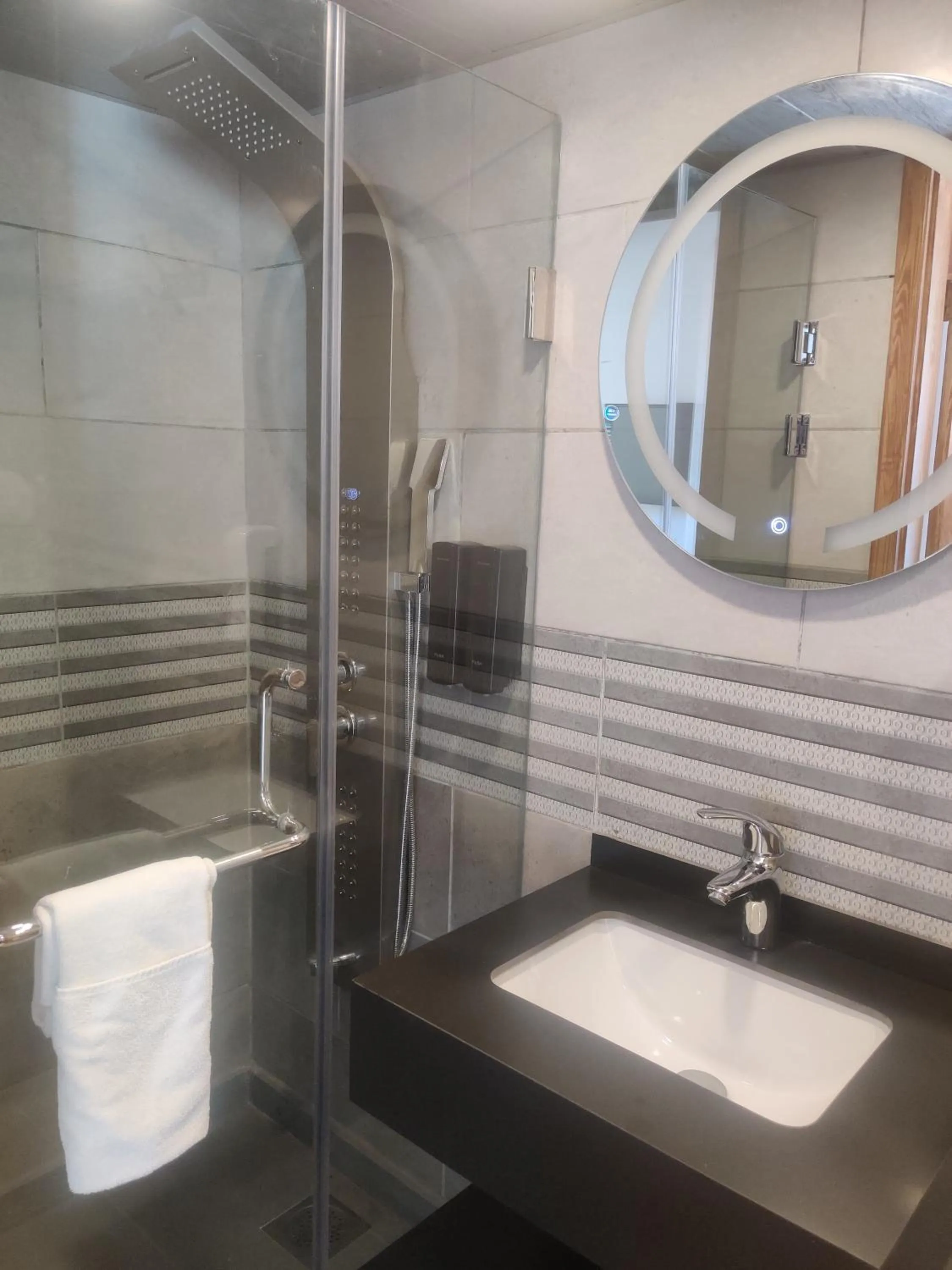 Bathroom in Bliss 3000 Furnished Studios