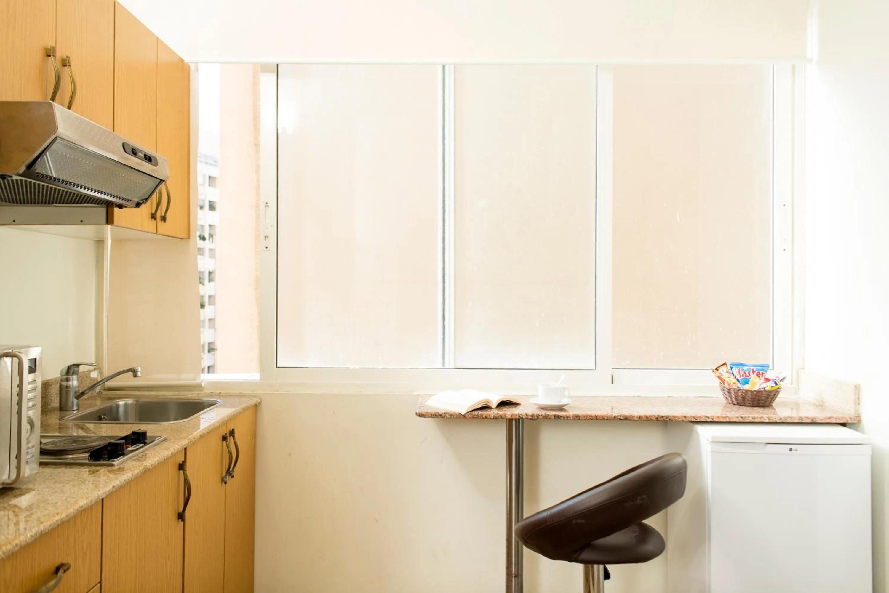 Kitchen or kitchenette in Bliss 3000 Furnished Studios