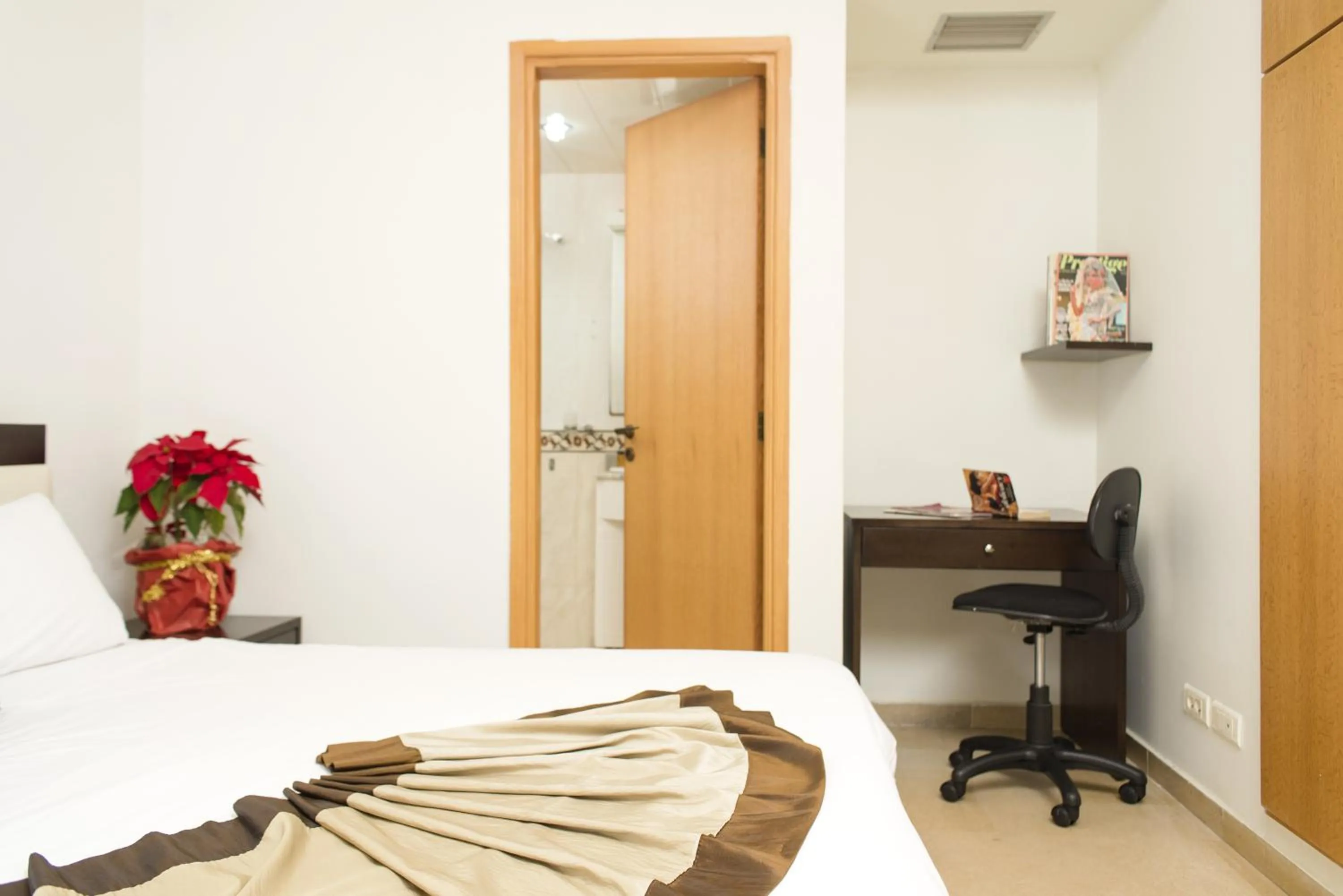 Bedroom, Bed in Bliss 3000 Furnished Studios