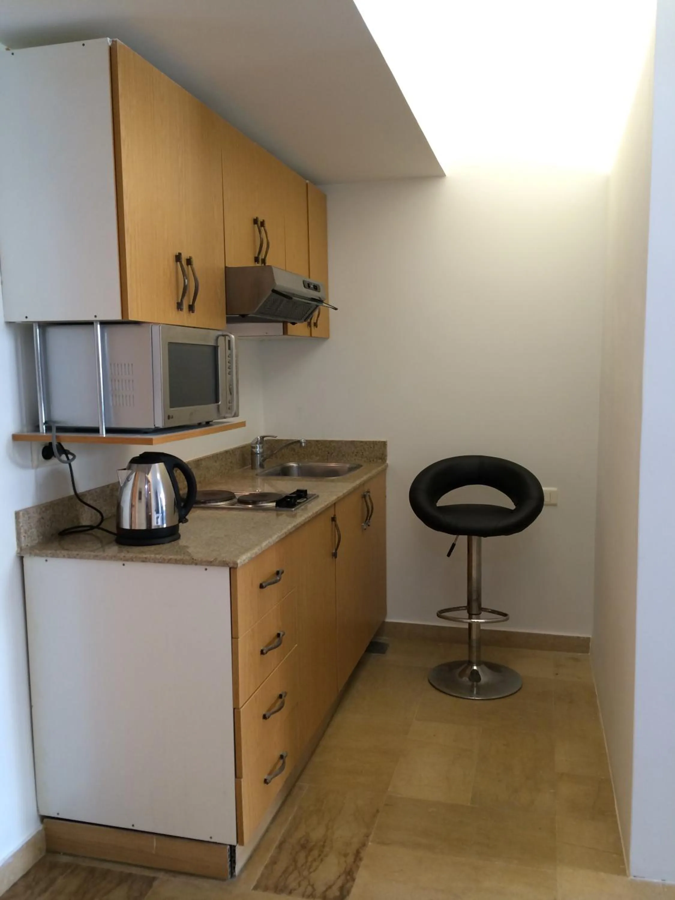 Kitchen or kitchenette in Bliss 3000 Furnished Studios