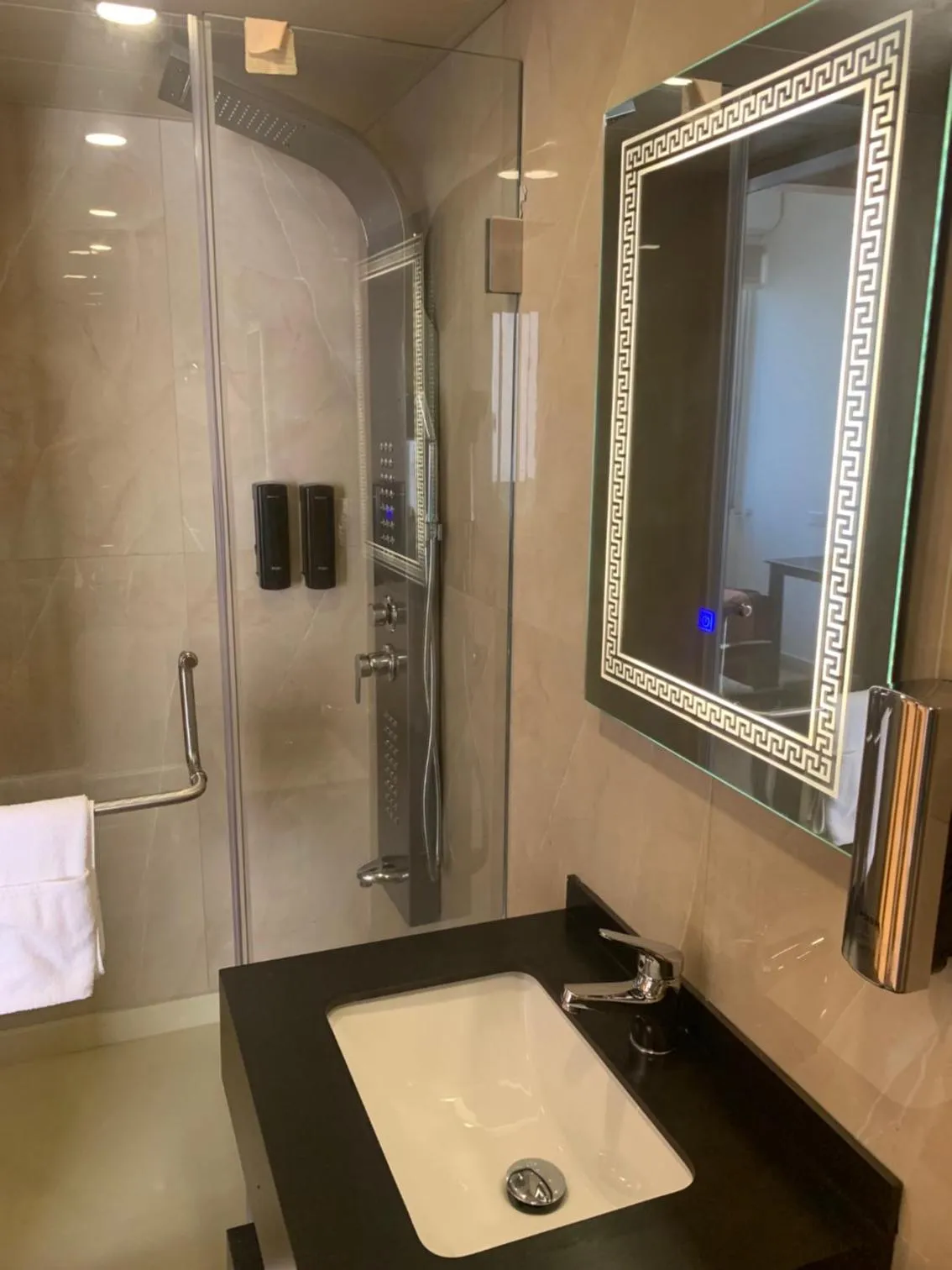 Shower in Bliss 3000 Furnished Studios