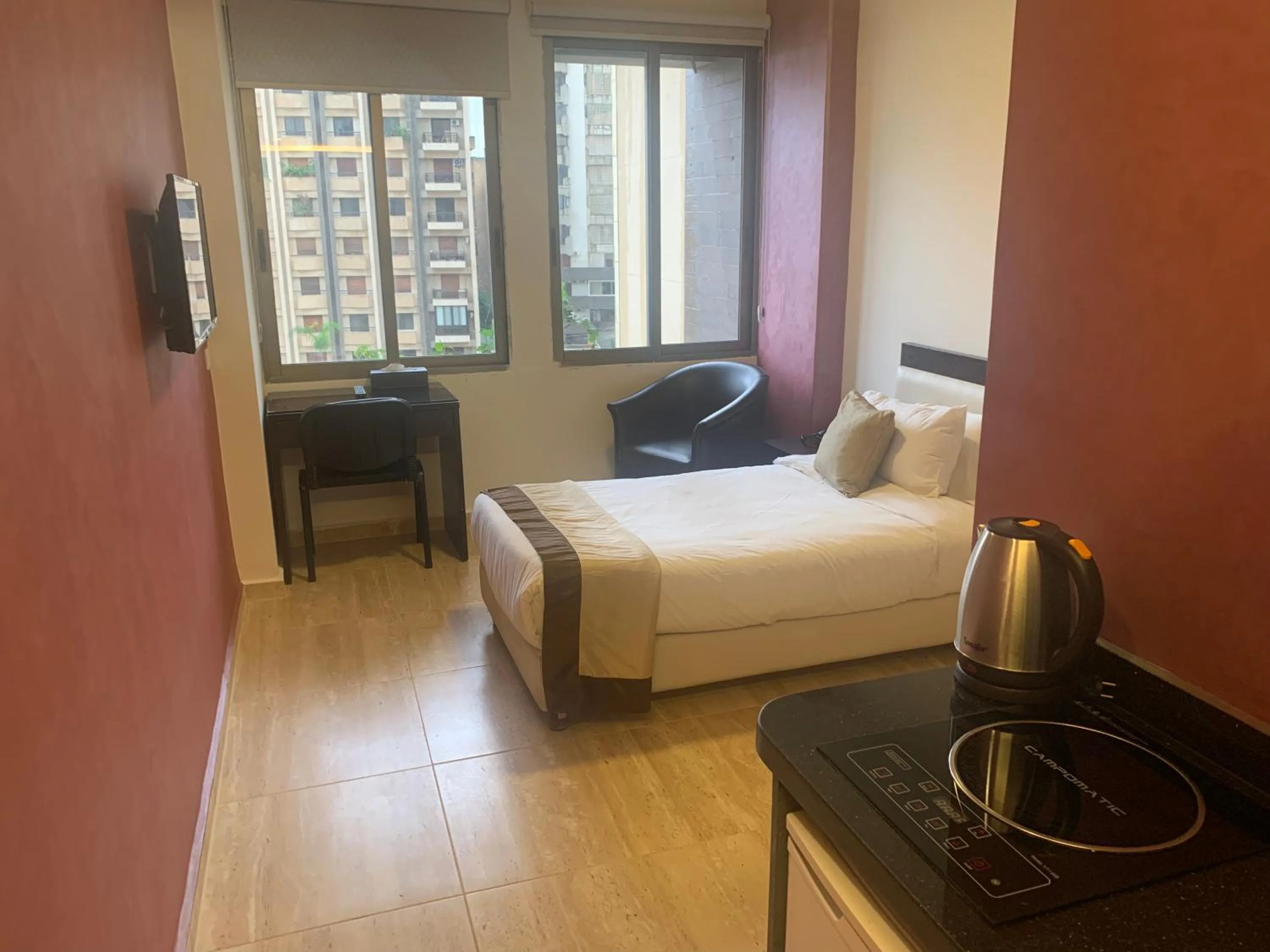 Photo of the whole room, Bed in Bliss 3000 Furnished Studios