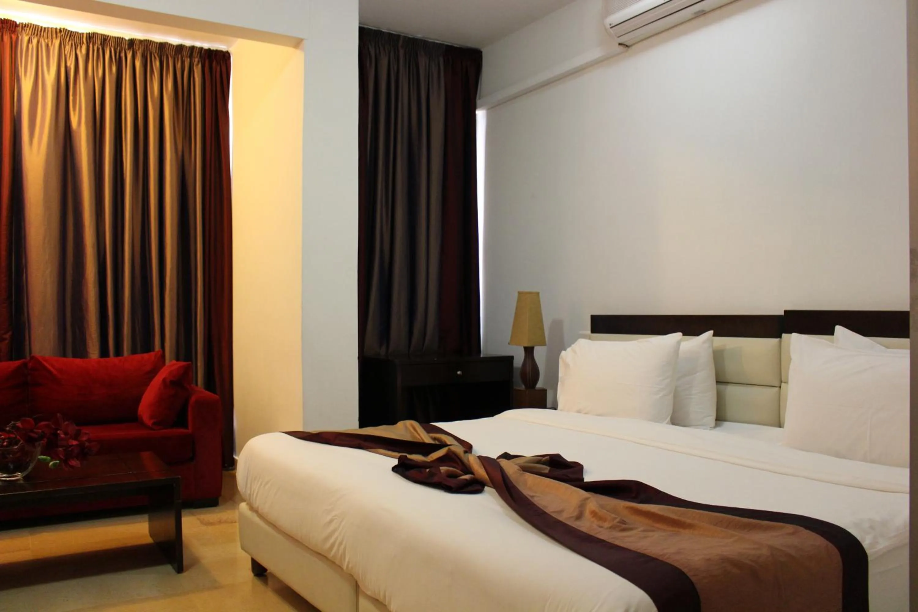 Bedroom, Bed in Bliss 3000 Furnished Studios