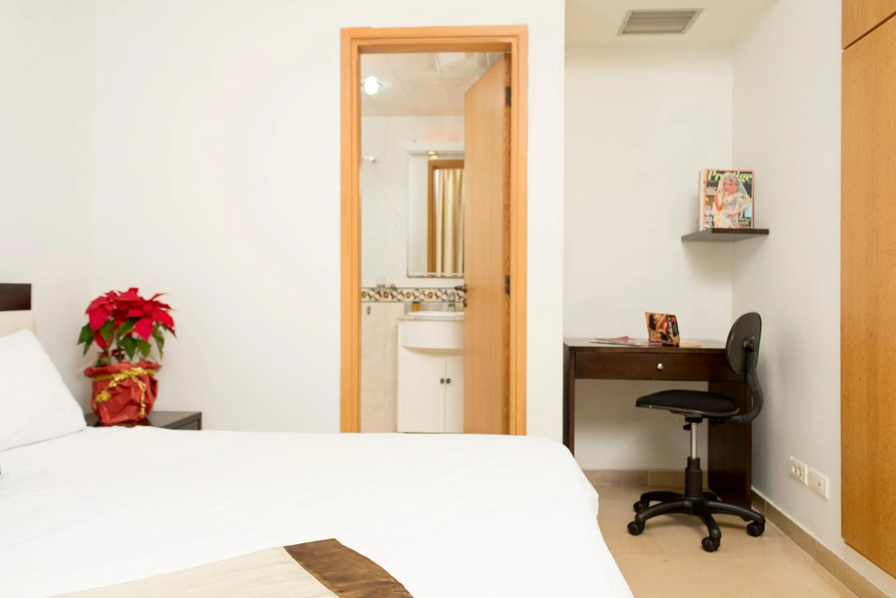 Bedroom, Bed in Bliss 3000 Furnished Studios