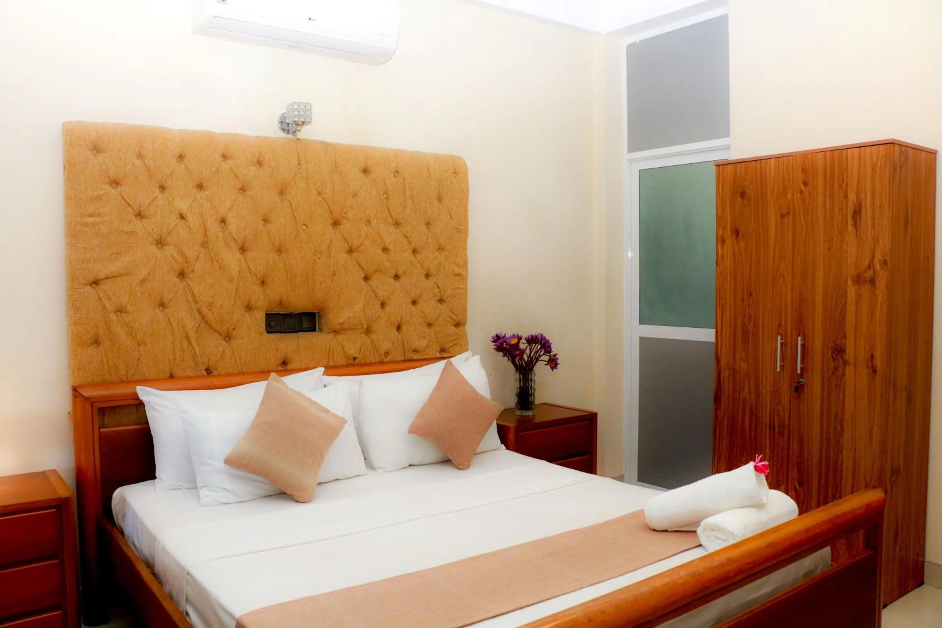 Bed in Queens Beach Hotel